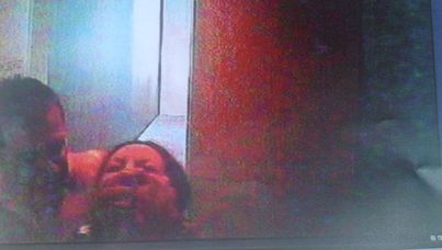 A still of footage captured on a pinhole camera of the accused Simon Gittany is alleged to have thrown his girlfriend Lisa Harnum from their Liverpool Street balcony in the CBD on 30 July, 2011 (AAP). 