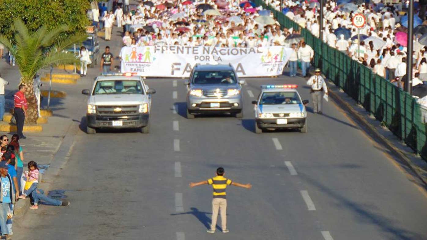 Picture of 12-year-old boy standing up to anti-gay protestors goes viral