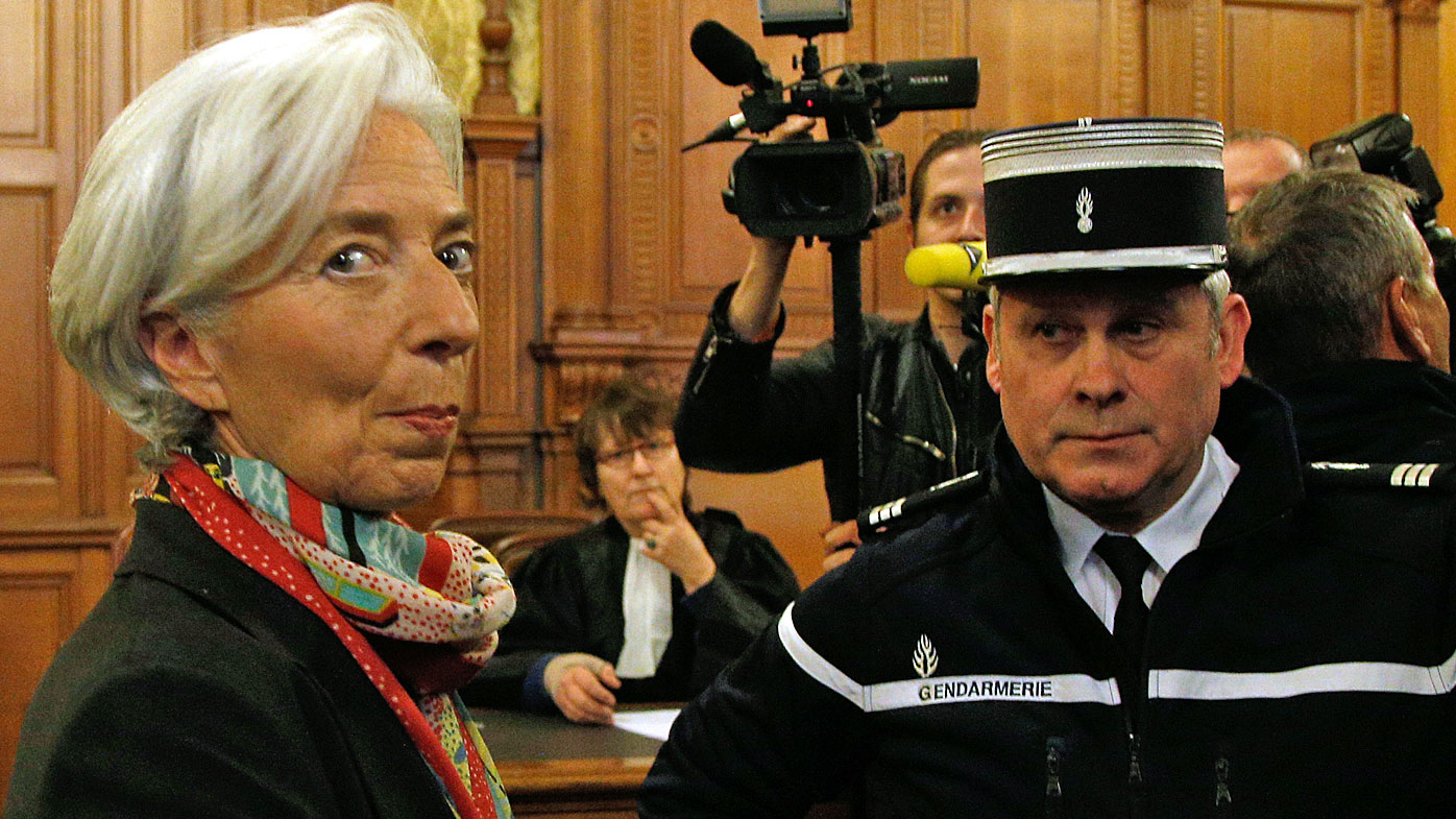 nternational Monetary Fund chief Christine Lagarde, right, arrives at the special Paris court, France. (AAP) 