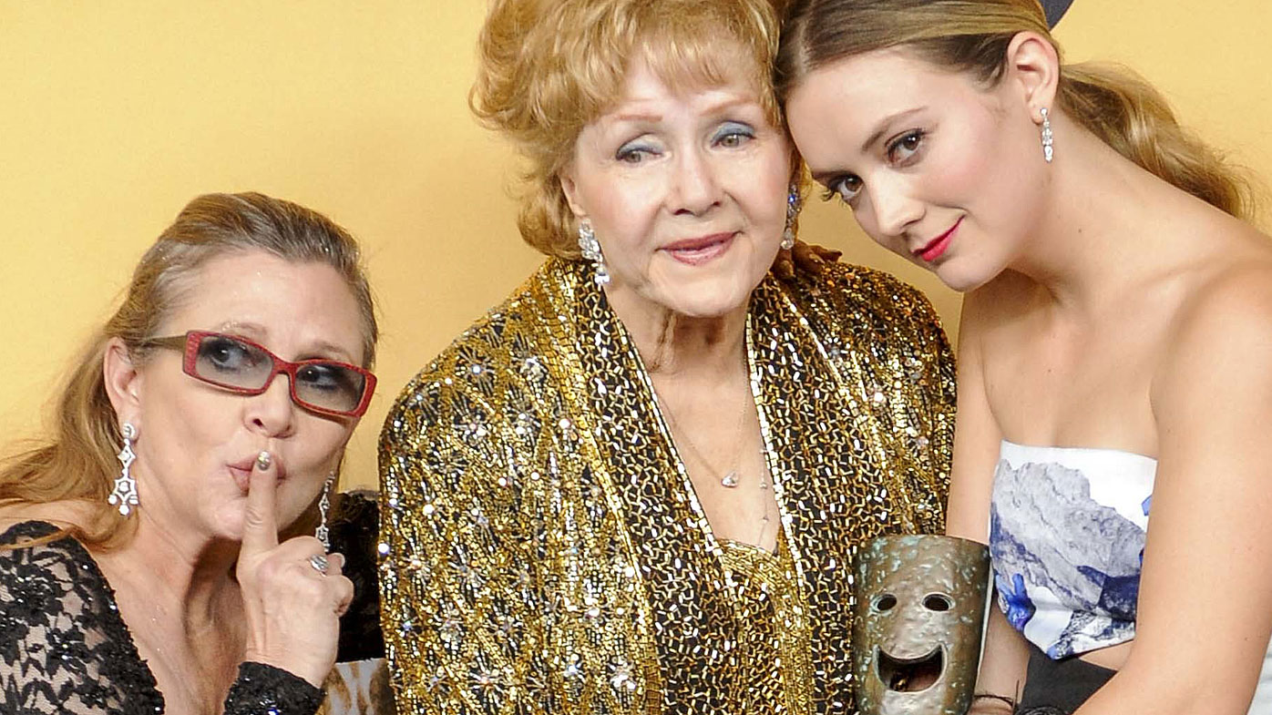 Billie Lourd (left)  is likely to inherit all of her mother's fortune and a large slice of her grandmother, Debbie Renyold's, wealth. (AAP)