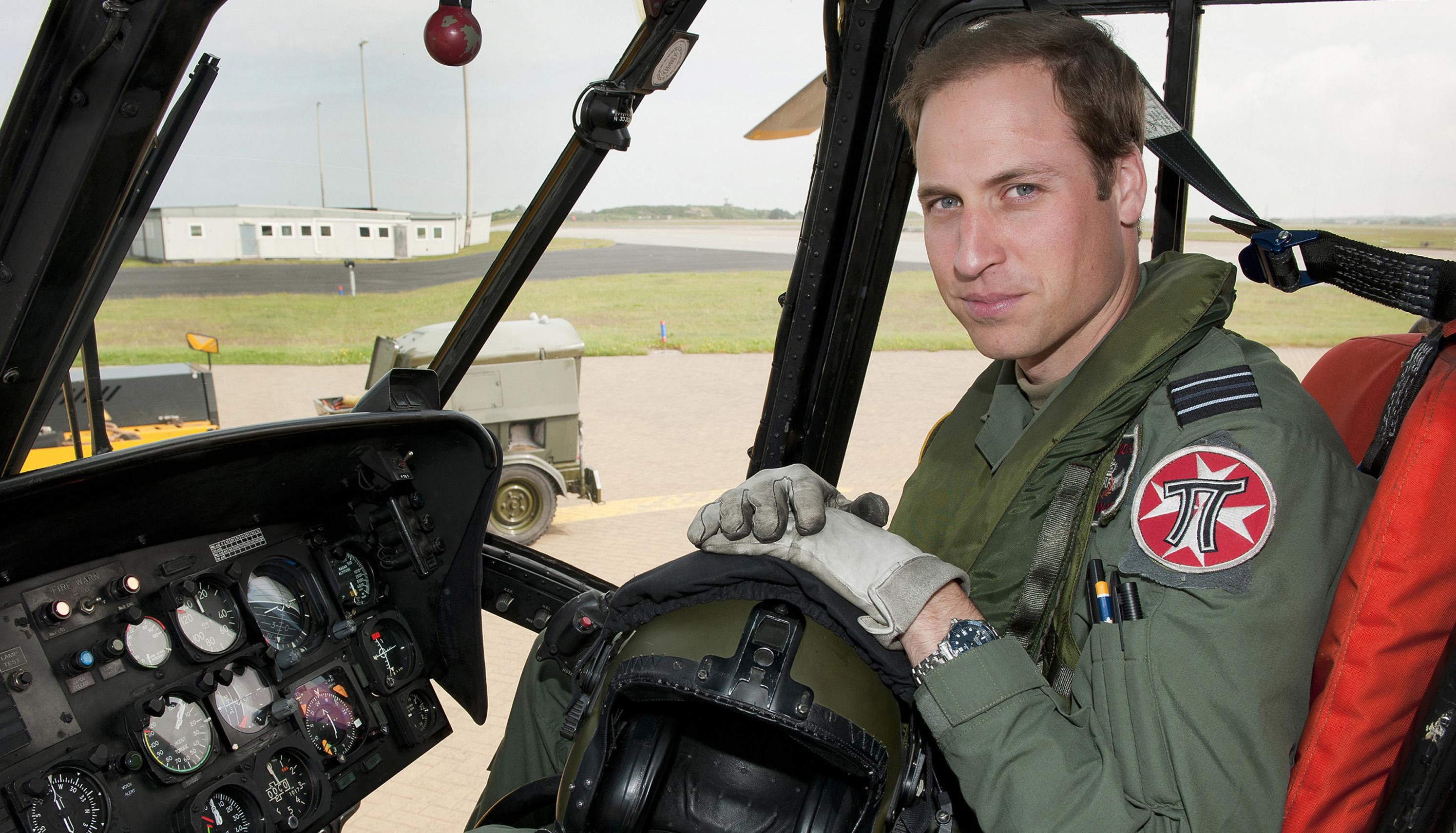 Prince William in the cockpit of a helicopter at RAF Valley in Anglesey, Wales in June 2012. (AAP)