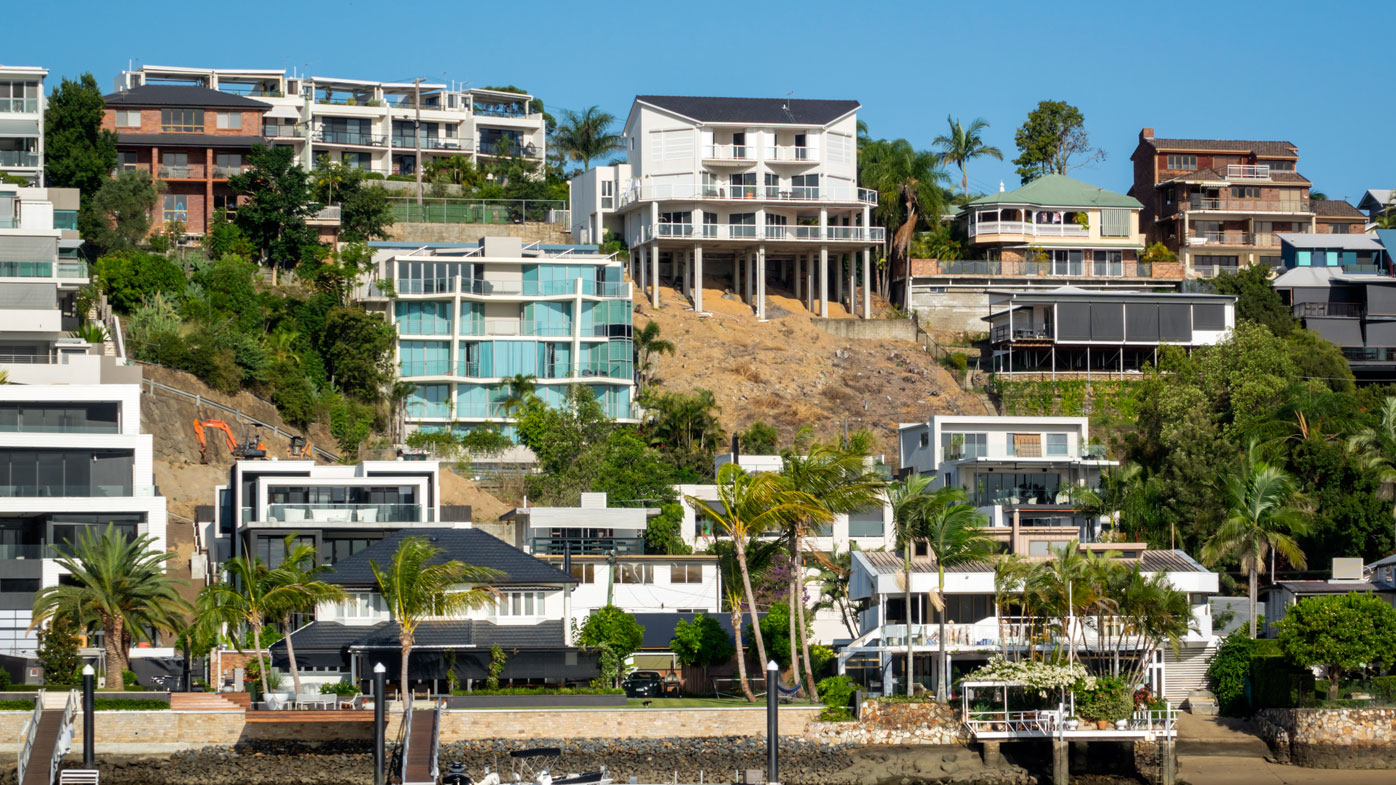 Houses along the Brisbane River (Photo by: Jeff Greenberg/UIG via Getty Images)