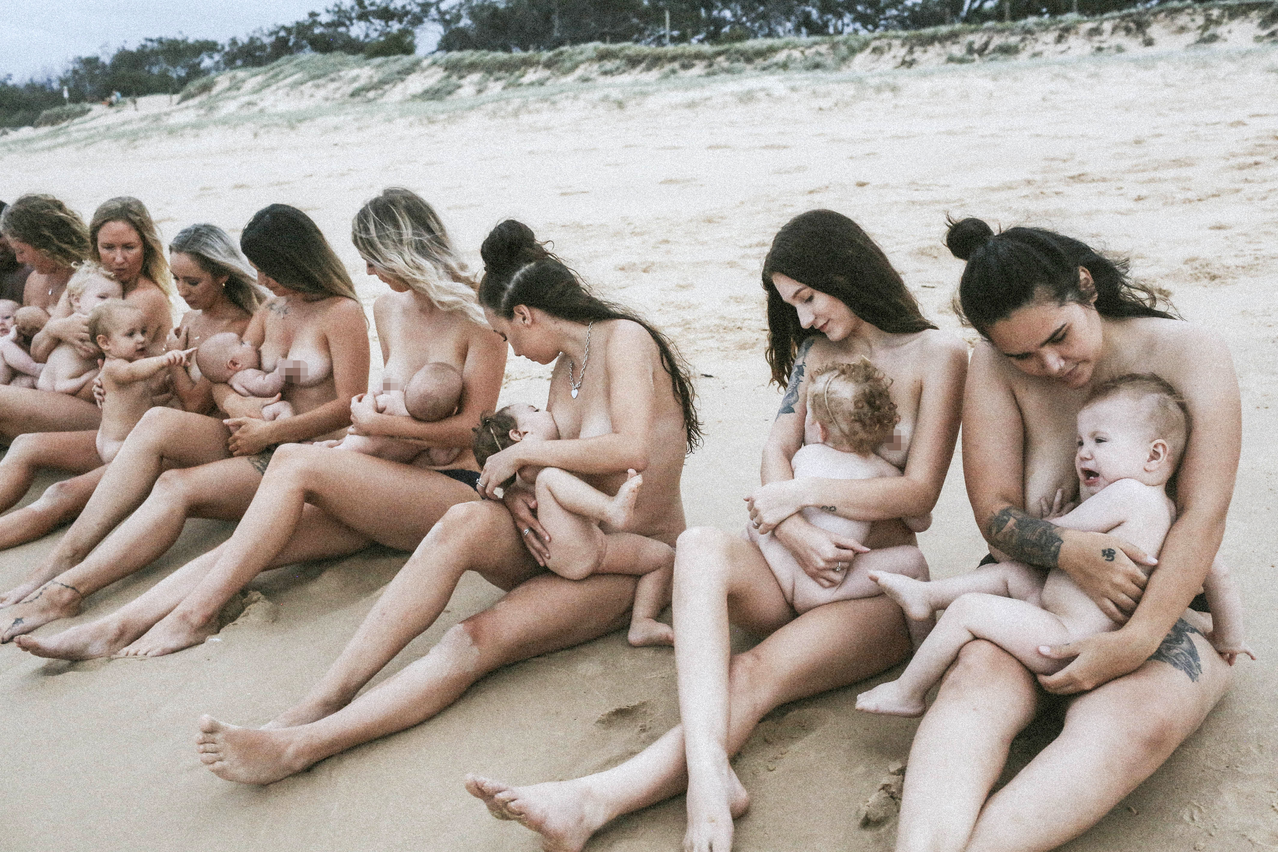 Women breastfeeding nude