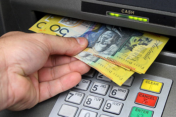ATM dispensing $50 notes