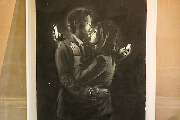 Banksy's 'Mobile Lovers'.