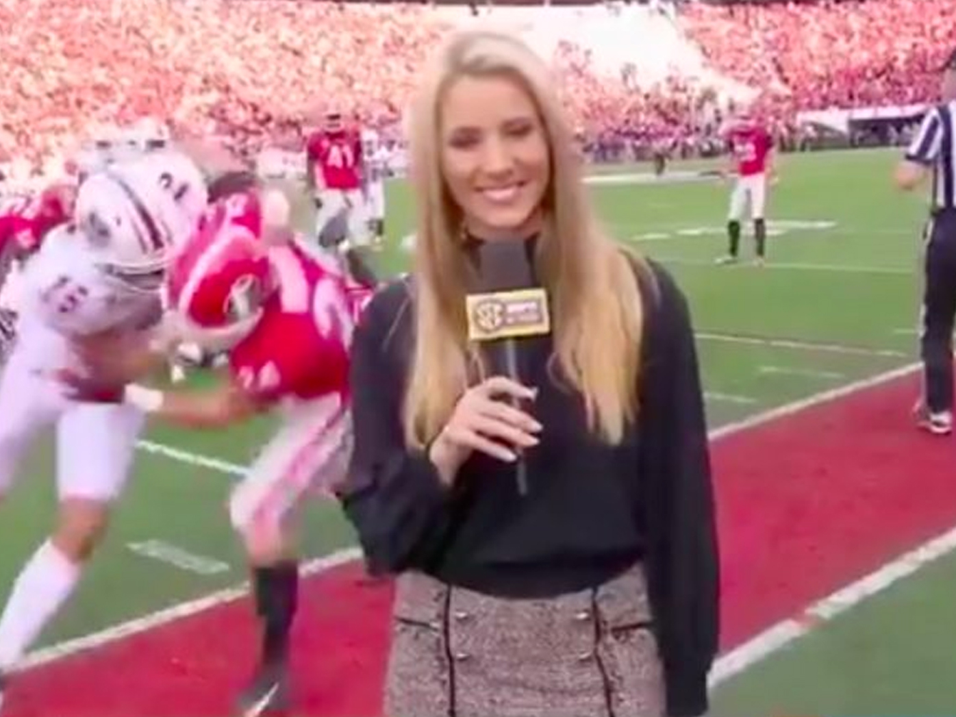 ESPN reporter Laura Rutledge flattened by college football players ...