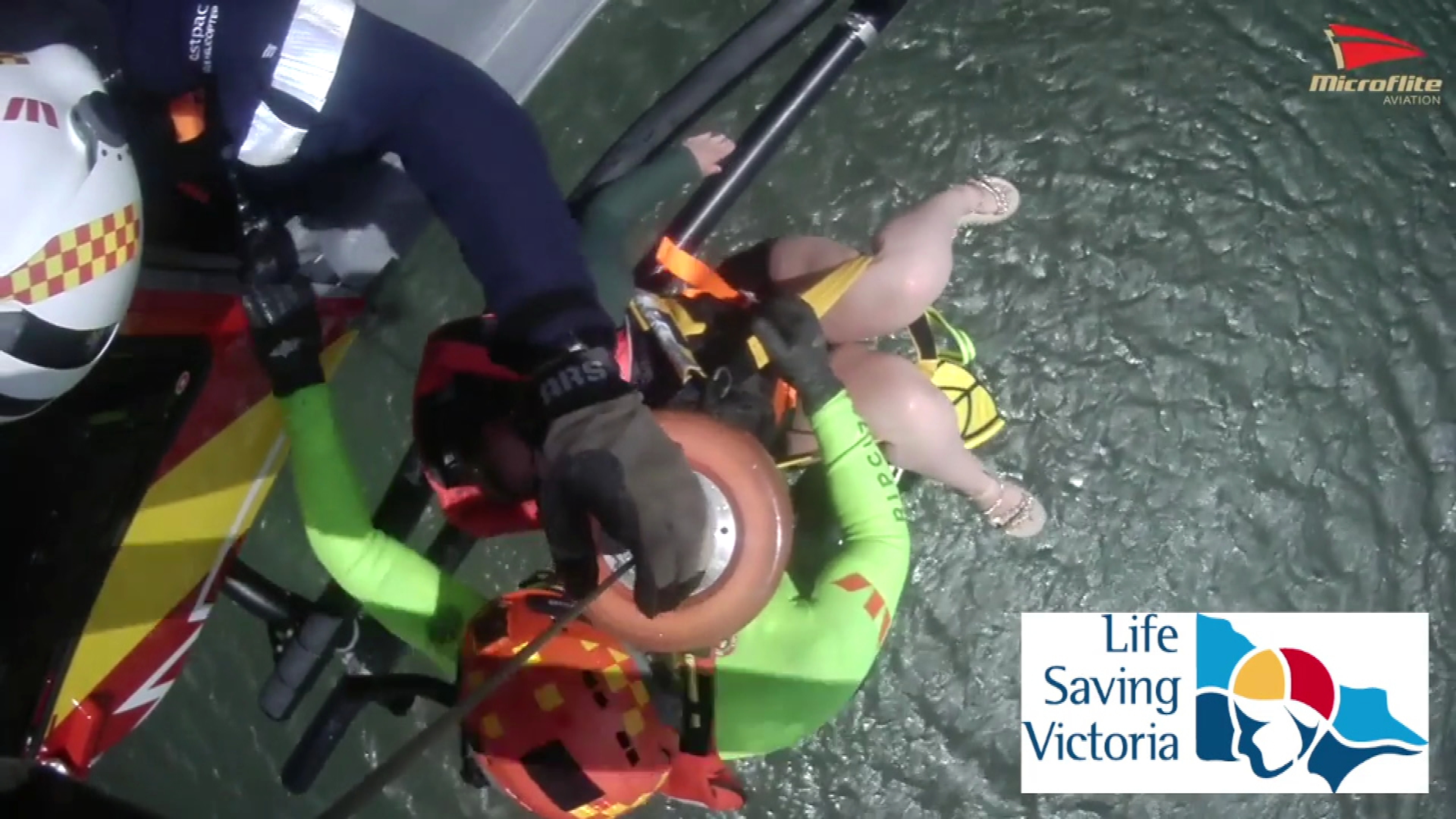 They were winched to safety by the Westpac Rescue Helicopter after police spotted them in the water.