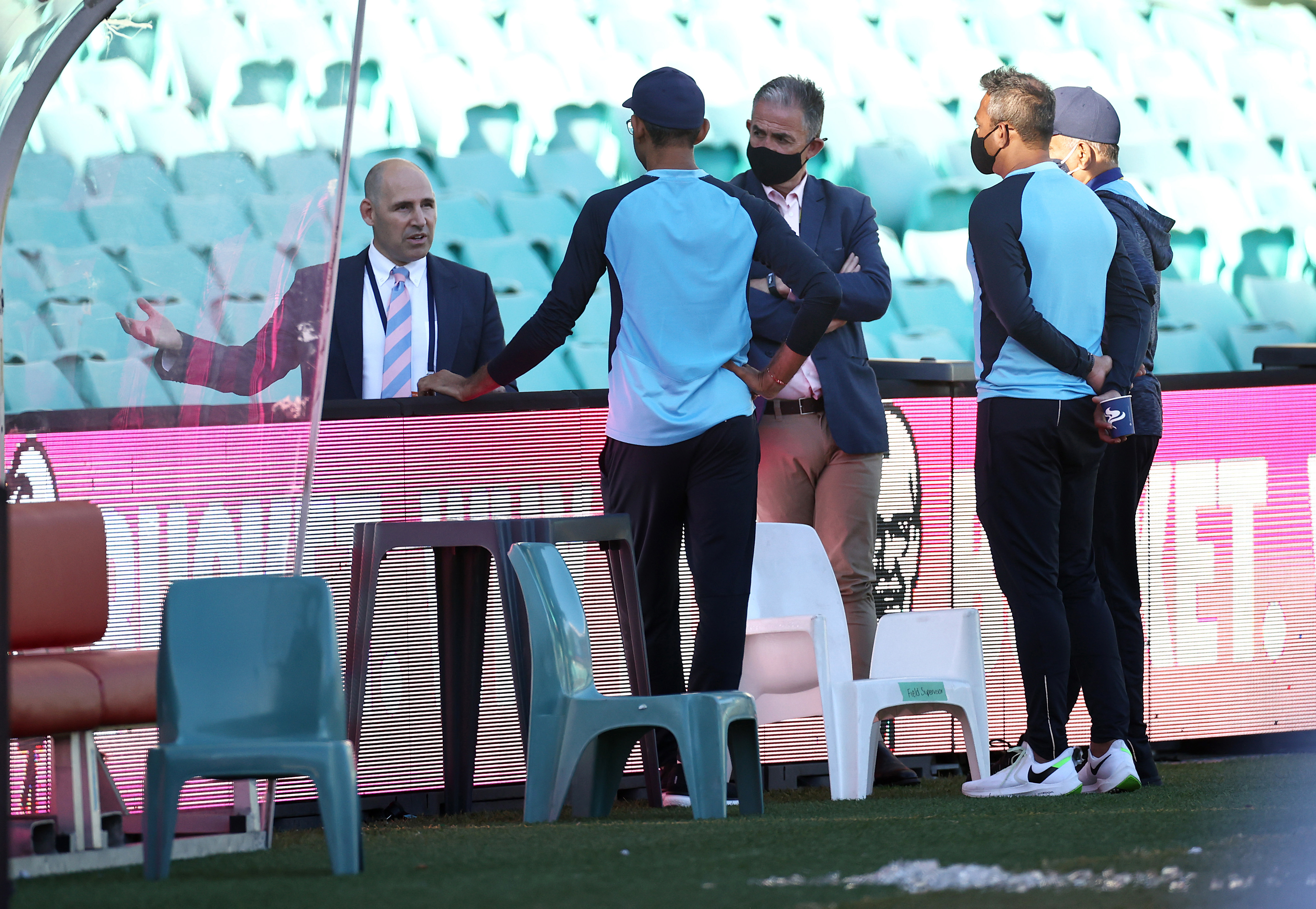 Cricket Australia CEO Nick Hockley and Cricket Australia Head of Integrity and Security Sean Carroll speak with Indian team management.