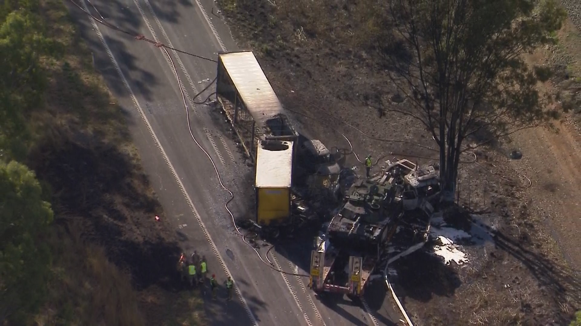 Seven vehicles, including a semi-trailer carrying a military tank, have crashed on the Bruce Highway near Rockhampton in Queensland.