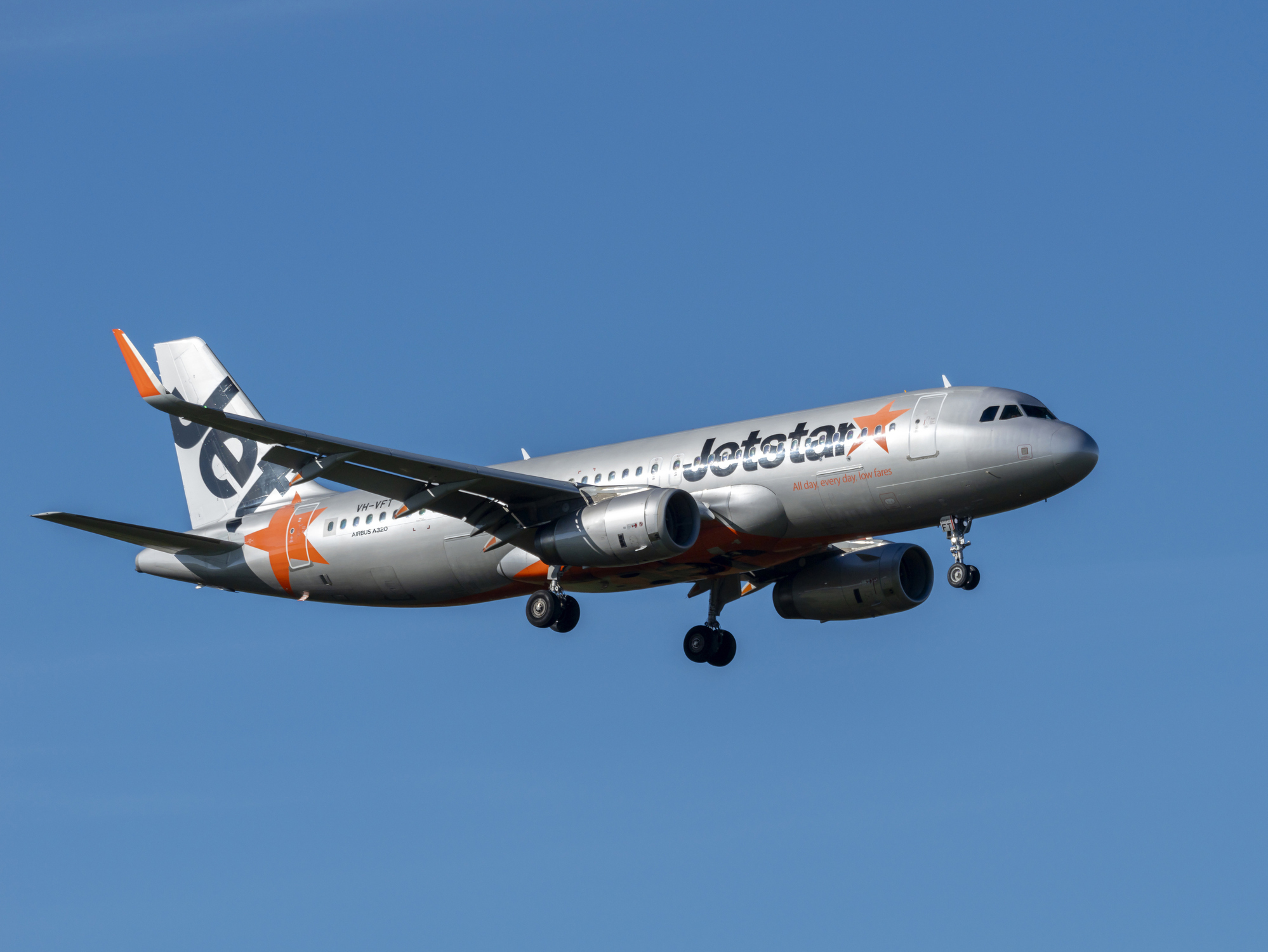 Auckland, New Zealand: June 28th, 2024. Jetstar Airbus A320 landing in Auckland International Airport.