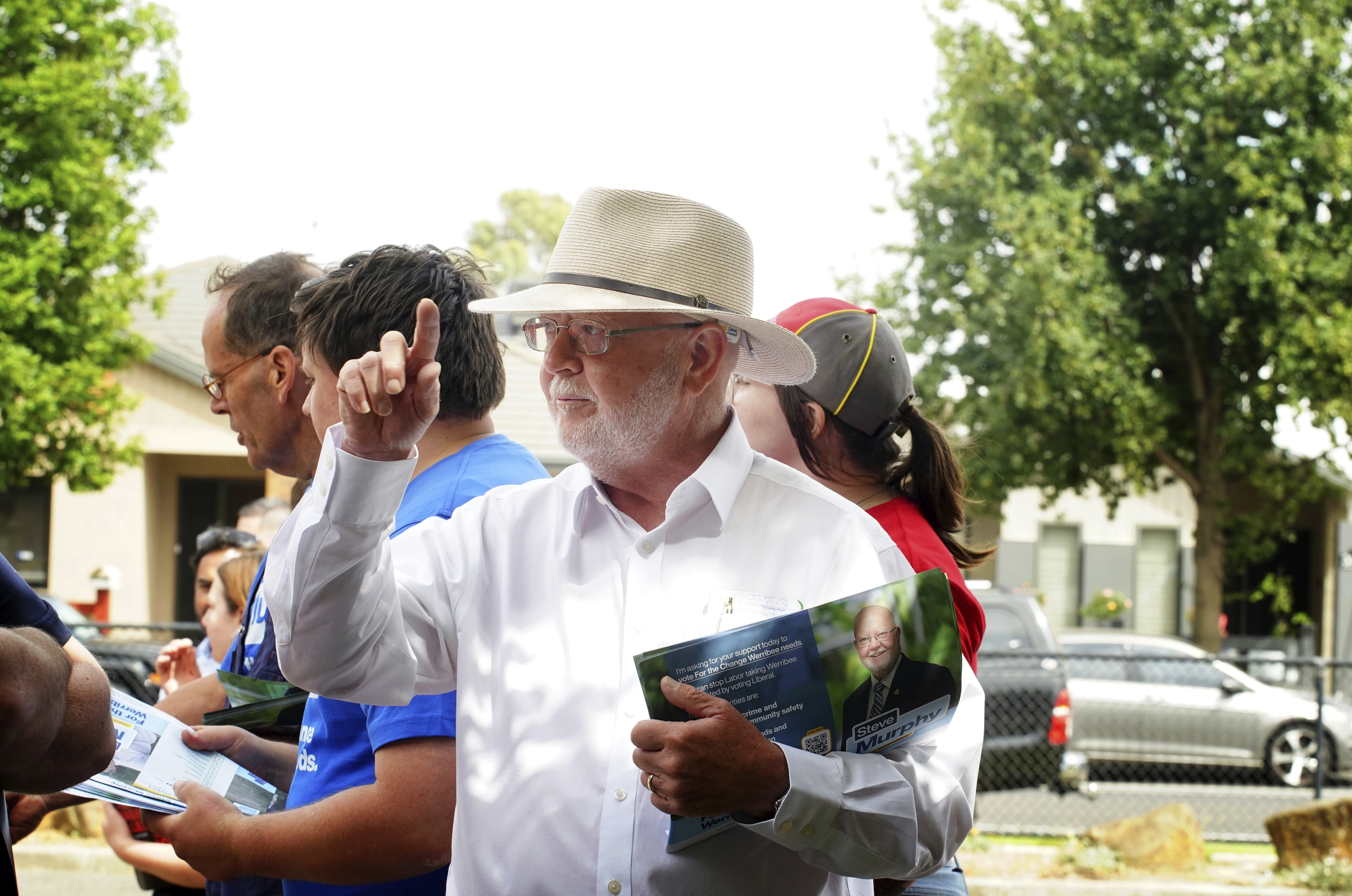 Steve Murphy, Liberal Party candidate for Werribee, is seen at Manor Lakes Primary School handing out how-to-vote cards in Wyndham Vale on Saturday, 8 February 2025. Photo THE AGE/ LUIS ENRIQUE ASCUI