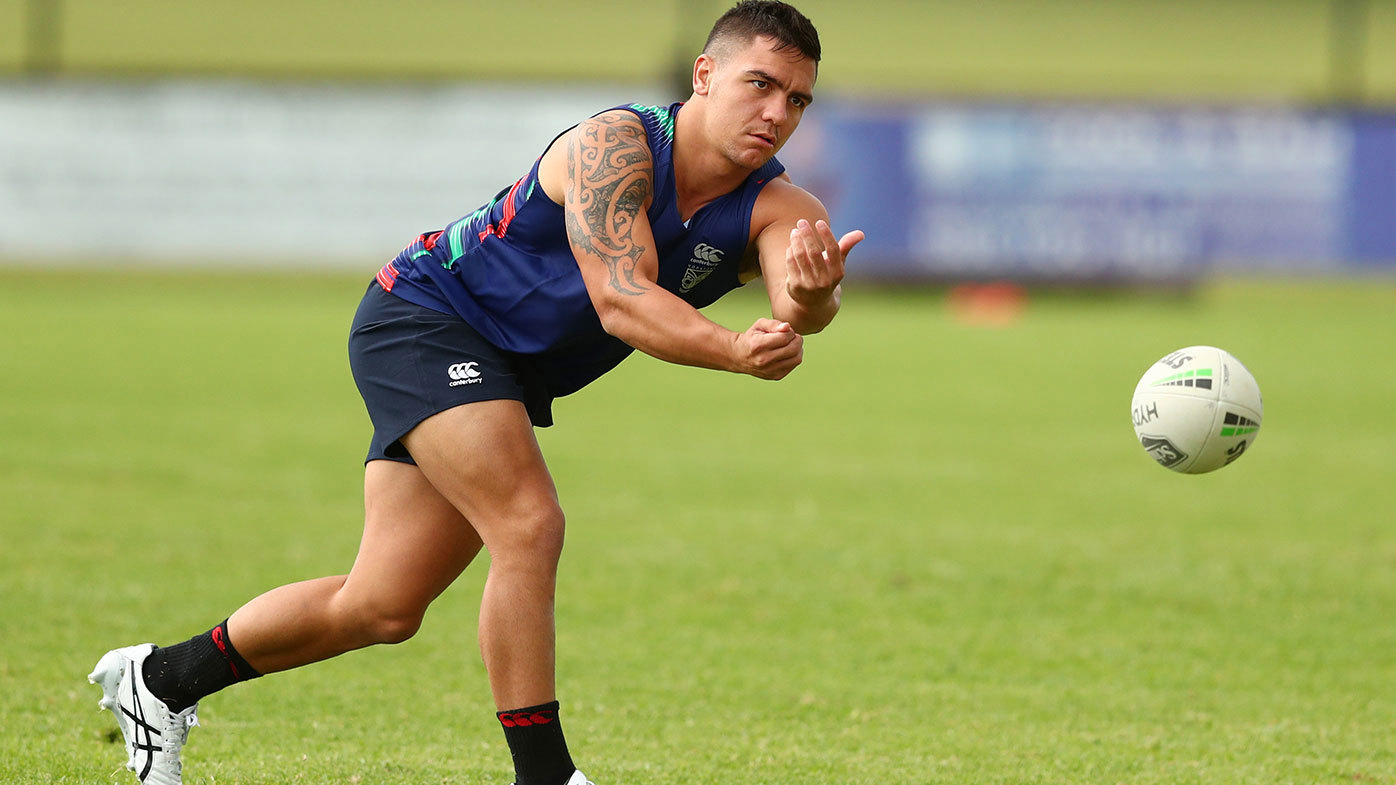  Kodi Nikorima passes during a New Zealand Warriors NRL training session