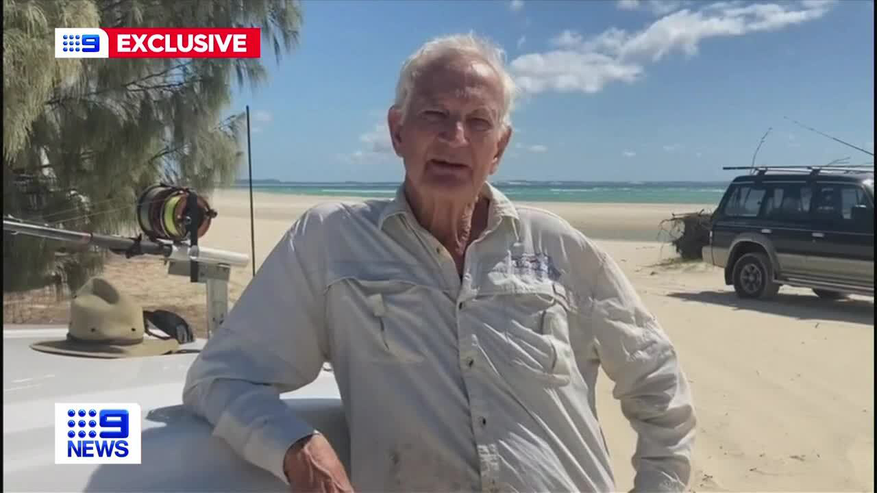 A retiree has been forced to wade into the water to dodge a pack of dingoes on the Queensland island of K'gari, formerly known as Fraser Island.Fisherman David Prain, 74, was forced into waist-deep water amid a stand-off with four of the animals.