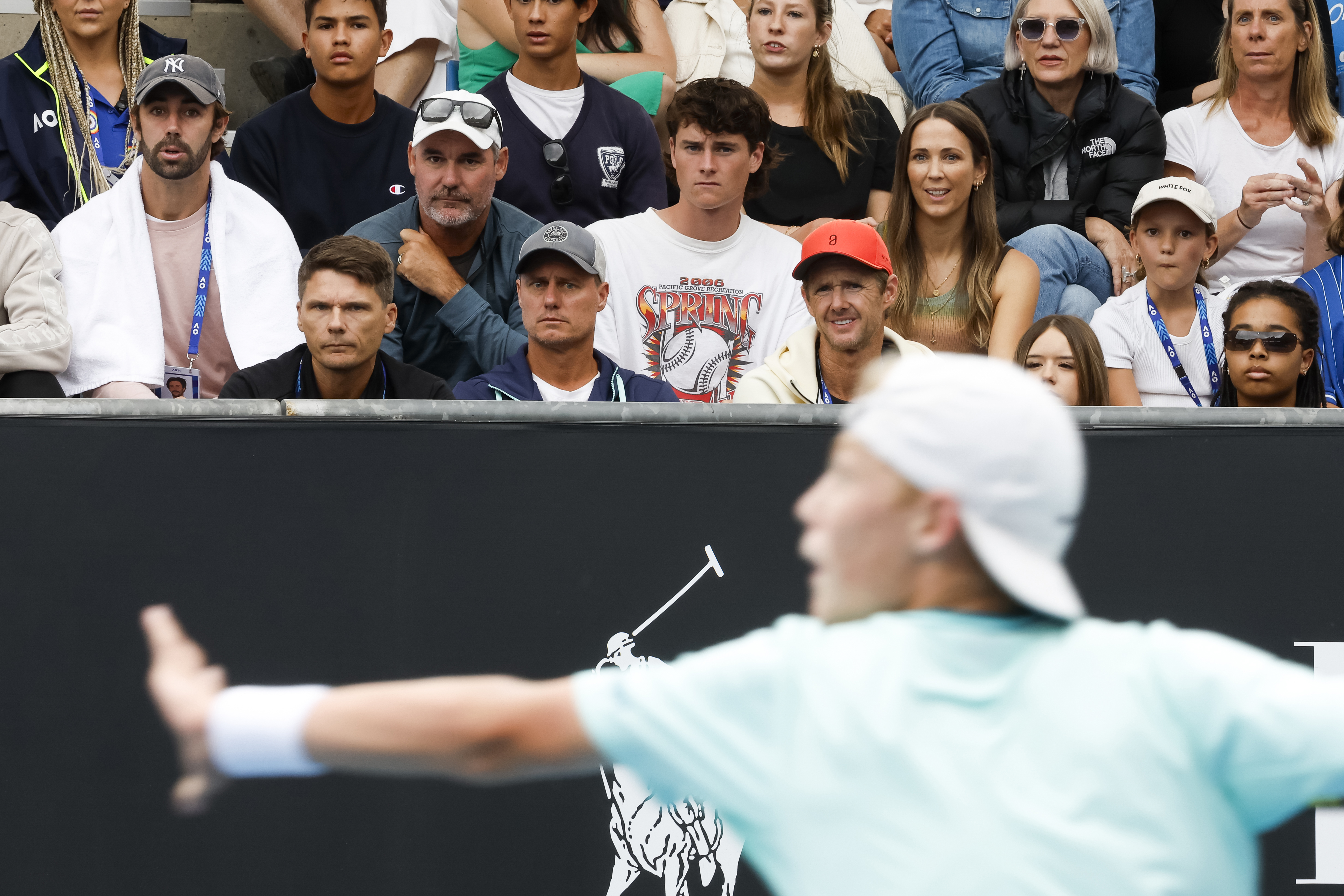 Lleyton and Bec Hewitt watch their son, Cruz Hewitt, compete at the Australian Open.