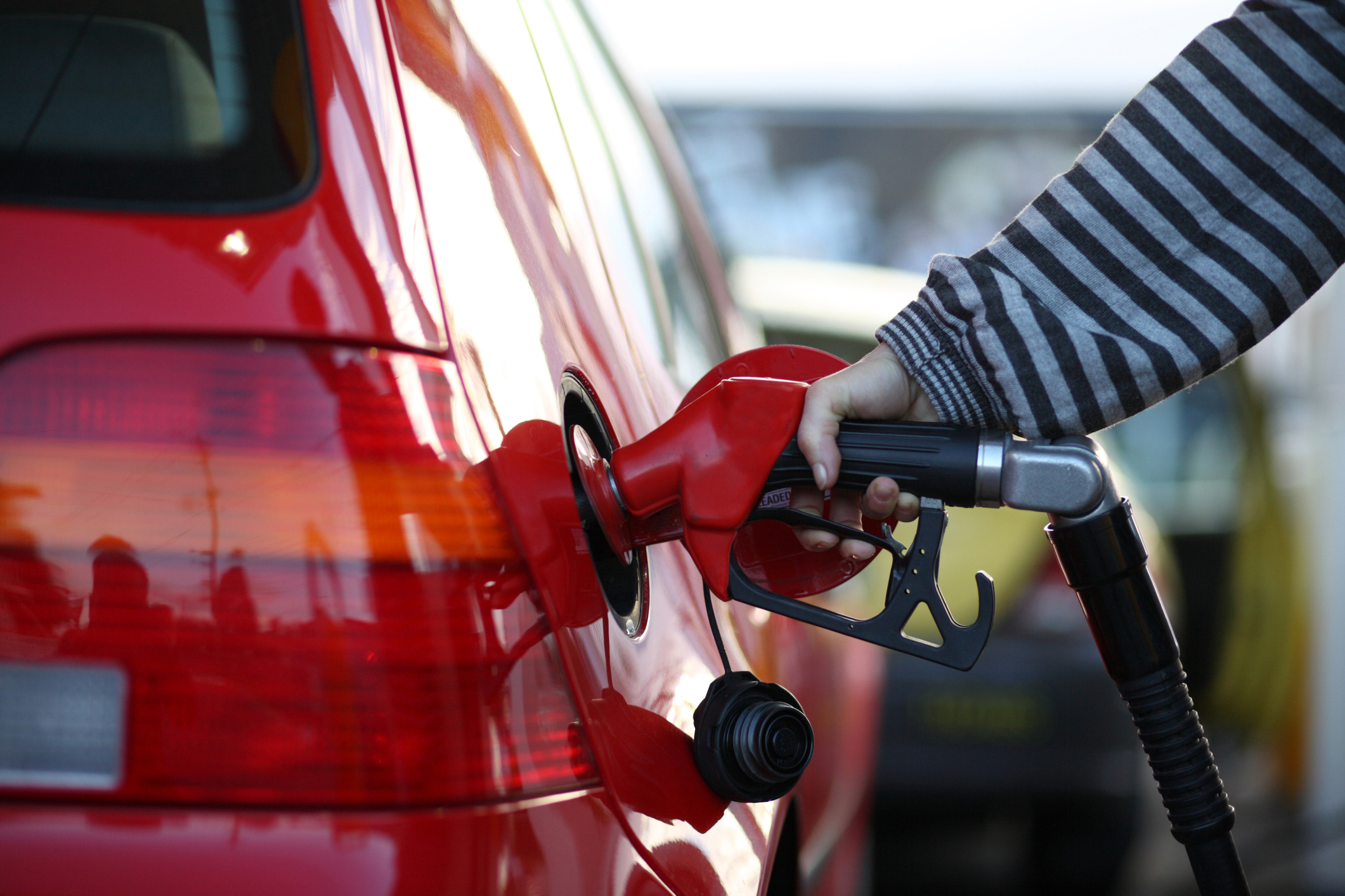 Women filling up at petrol station