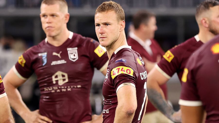 Daly Cherry-Evans of the Maroons and team mates look dejected at full time after being thrashed by New South Wales in Origin II.