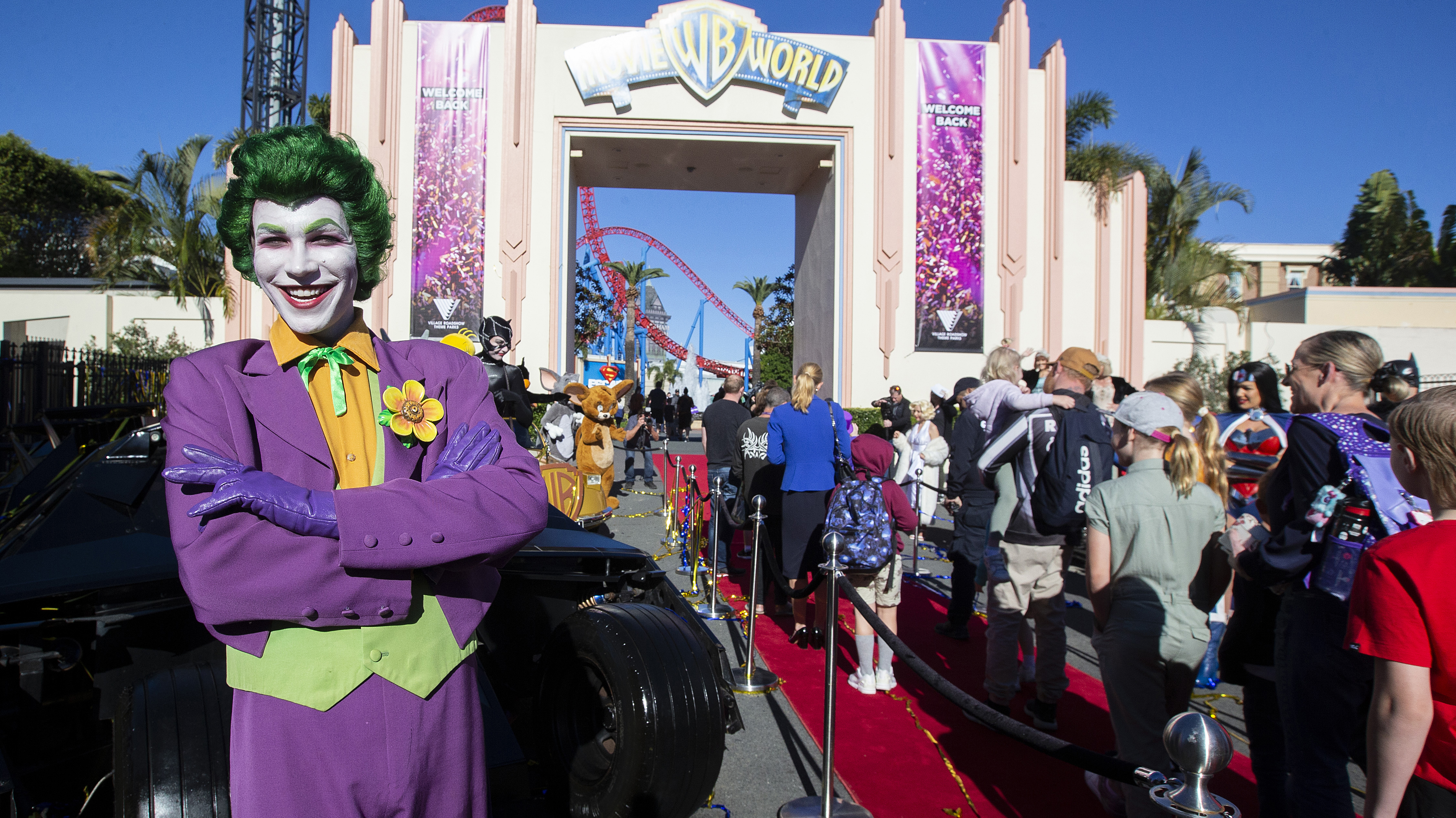 A performer welcomes guests at Warner Bros. Movie World on July 15, 2020 in Gold Coast, Australia. Movie World has reopened to the public with extra safety and hygiene measures in place following its temporary closure on 23 March 2020 due to the COVID-19 pandemic. 