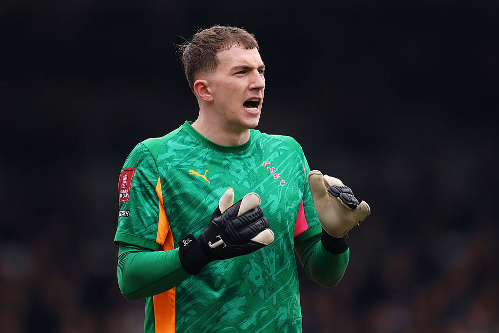 Joe Gauci of Port Vale looks on.