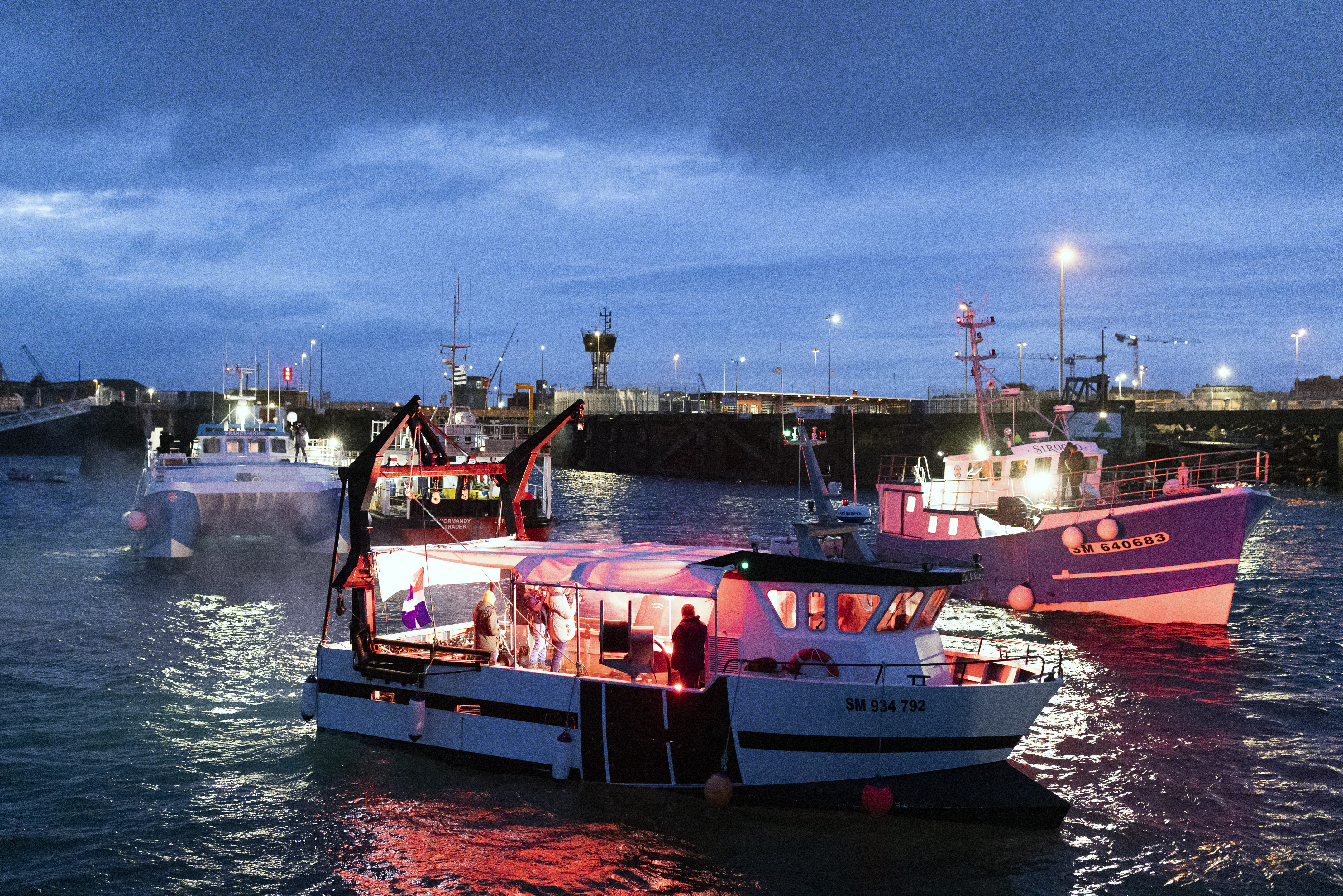 French fishing boats block the entrance to the port of Saint-Malo, western France, Friday, Nov. 26, 2021. 