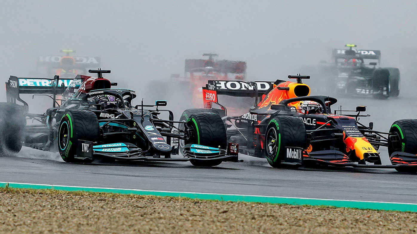 Lewis Hamilton and Max Verstappen battle at the start of the Imola race.