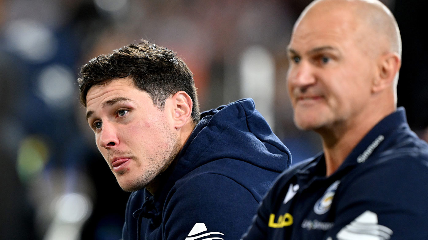 Mitchell Moses sits alongside then Eels coach Brad Arthur.