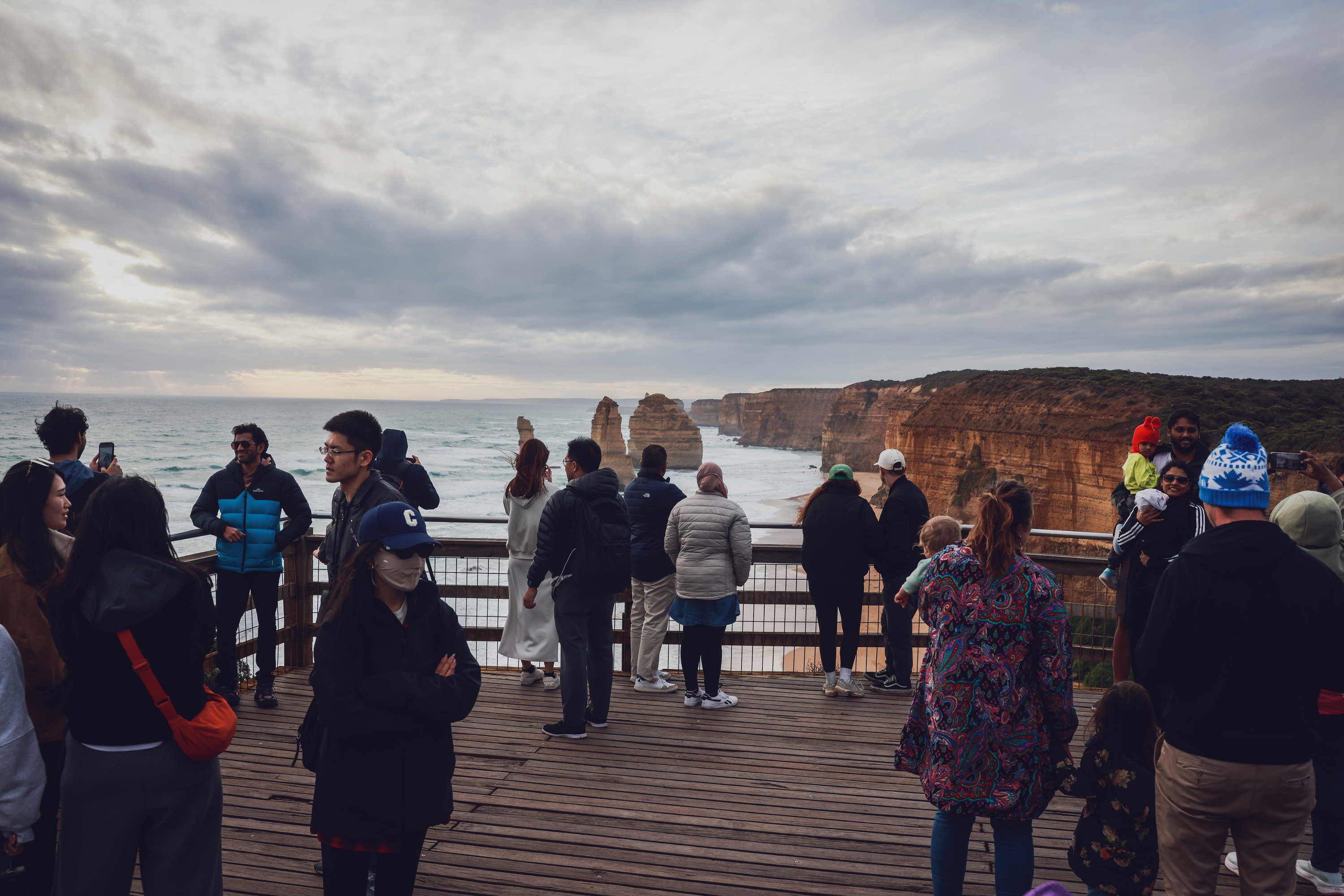 Visitors at Victoria's scenic coastline at Port Campbell. The popular tourist spot is slowly eroding over the years where visitors come to see the 12 Apostles.