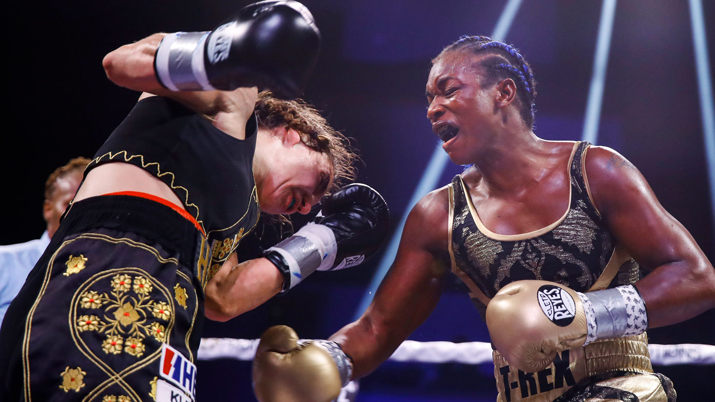 Claressa Shields makes boxing history, defeats Ivana Habazin in 154 ...
