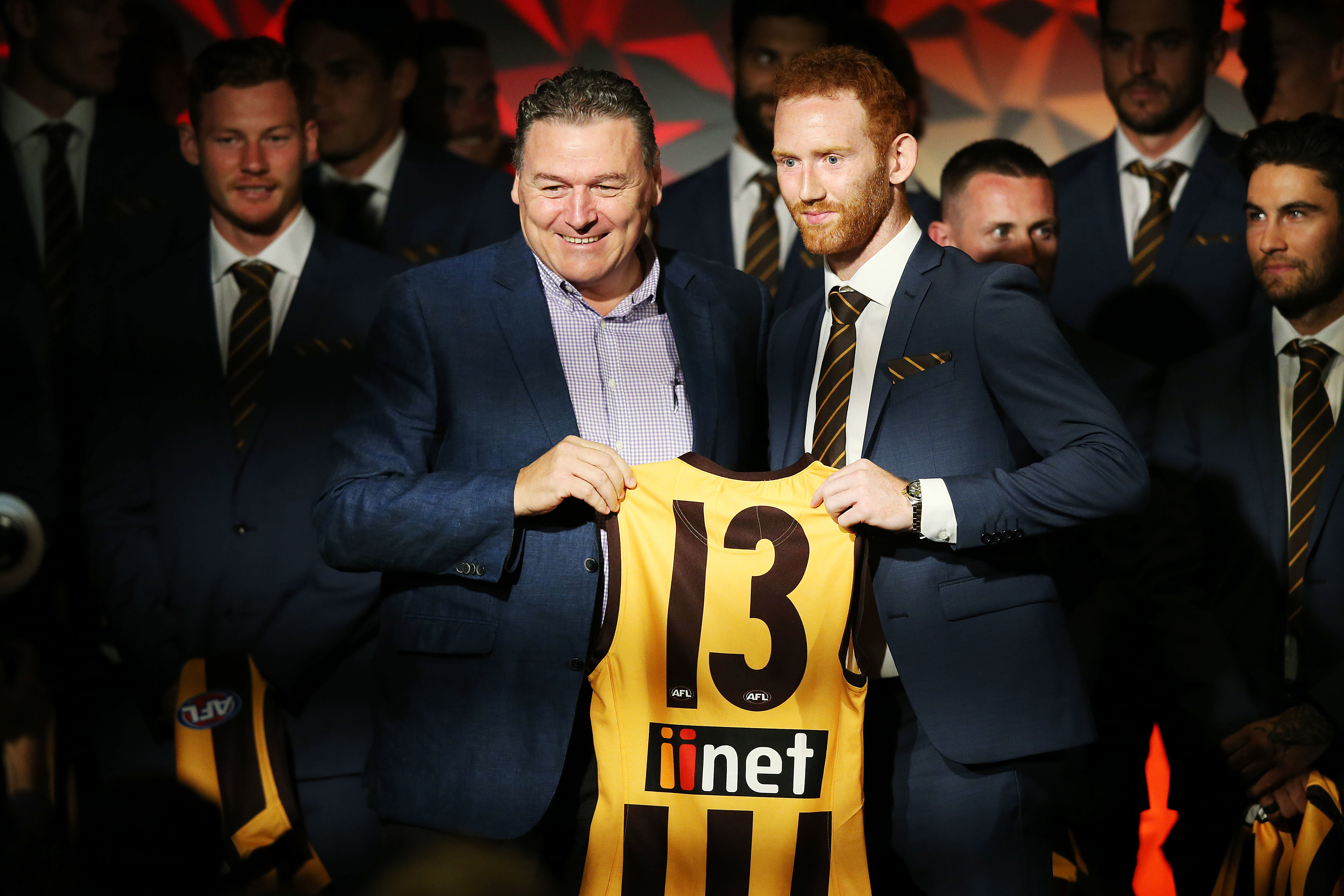 Paul Dear presenting Conor Glass with his jumper back in 2019.