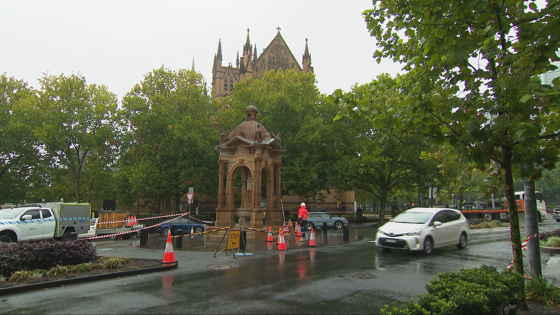 A large sinkhole has opened up on a busy street in Sydney CBD, forcing a nearby school to close and leaving businesses without water.