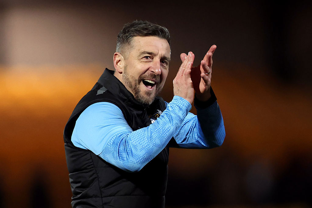 Jon Brady celebrates victory over Bristol City.