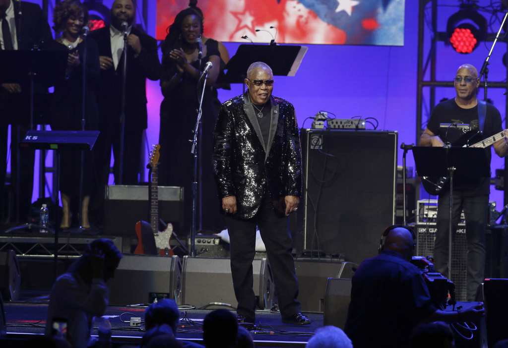 FILE - Sam Moore walks on stage to perform during a hurricanes relief concert in College Station, Texas, Oct. 21, 2017. (AP Photo/LM Otero, File)