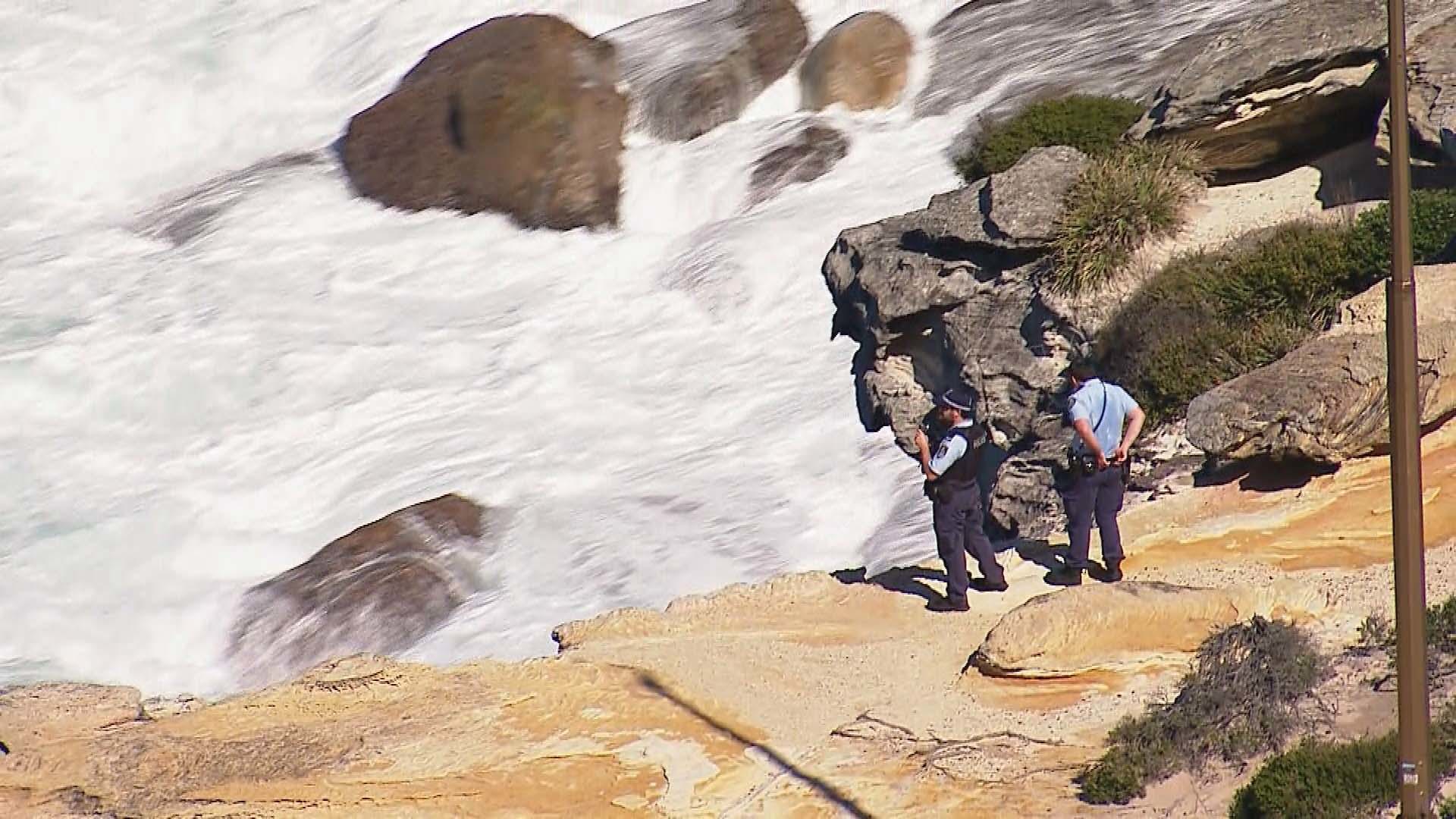 A fisherman has died and a teenager was been rushed to hospital after being washed off rocks in Sydney's south on Easter Sunday.The pair were swept into the water at Wattamolla, in the Royal National Park around 11am, in what is the sixth drowning death this Easter.