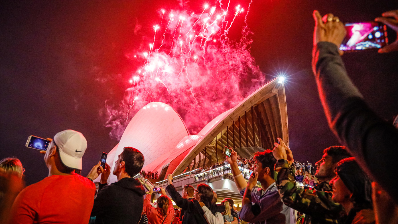 Fireworks explode over the Sydney Harbour Bridge and Sydney Opera House during the midnight display during New Year's Eve celebrations on January 01, 2020 