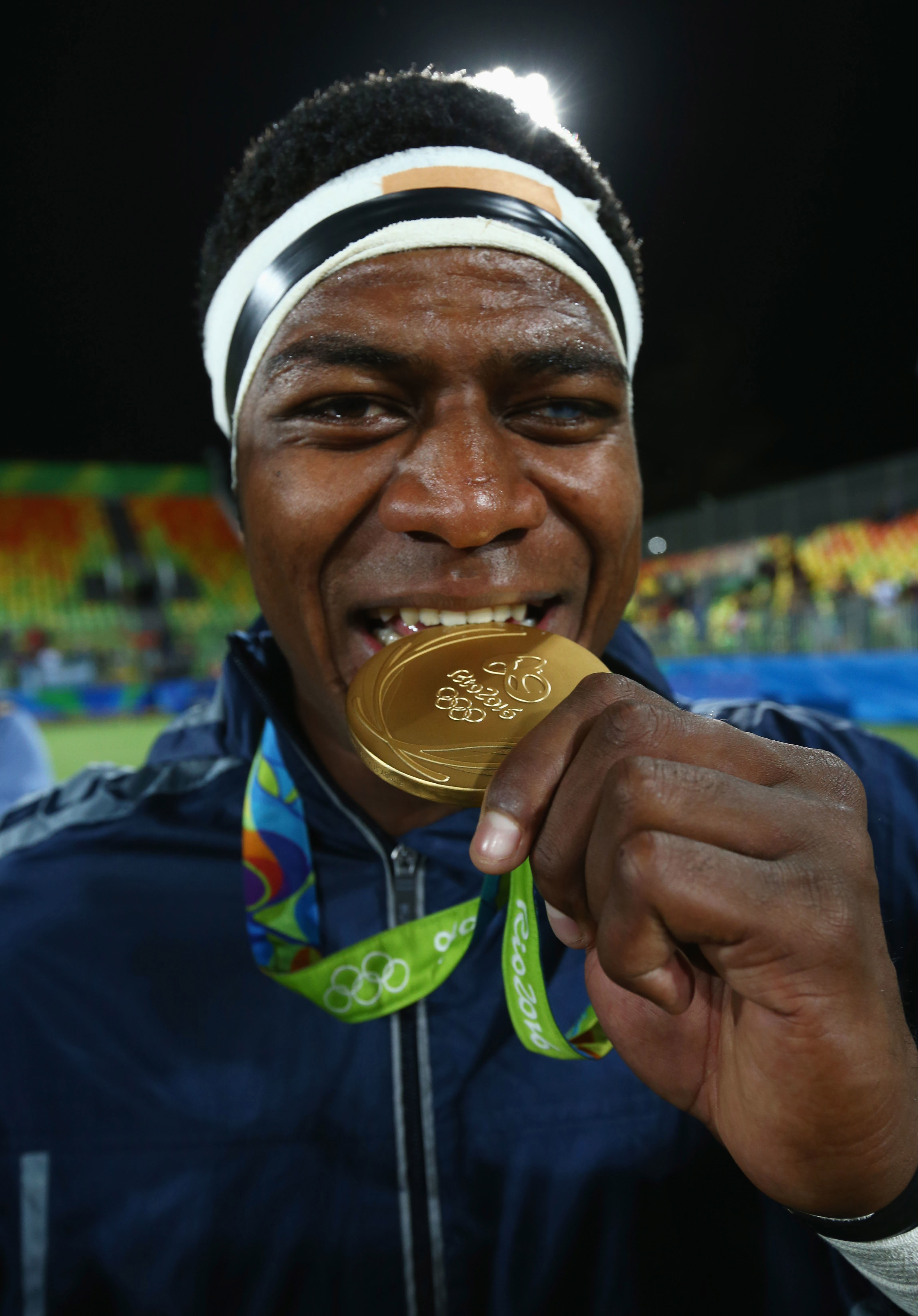 Masivesi Dakuwaqa with his gold medal at the Rio 2016 Olympics.