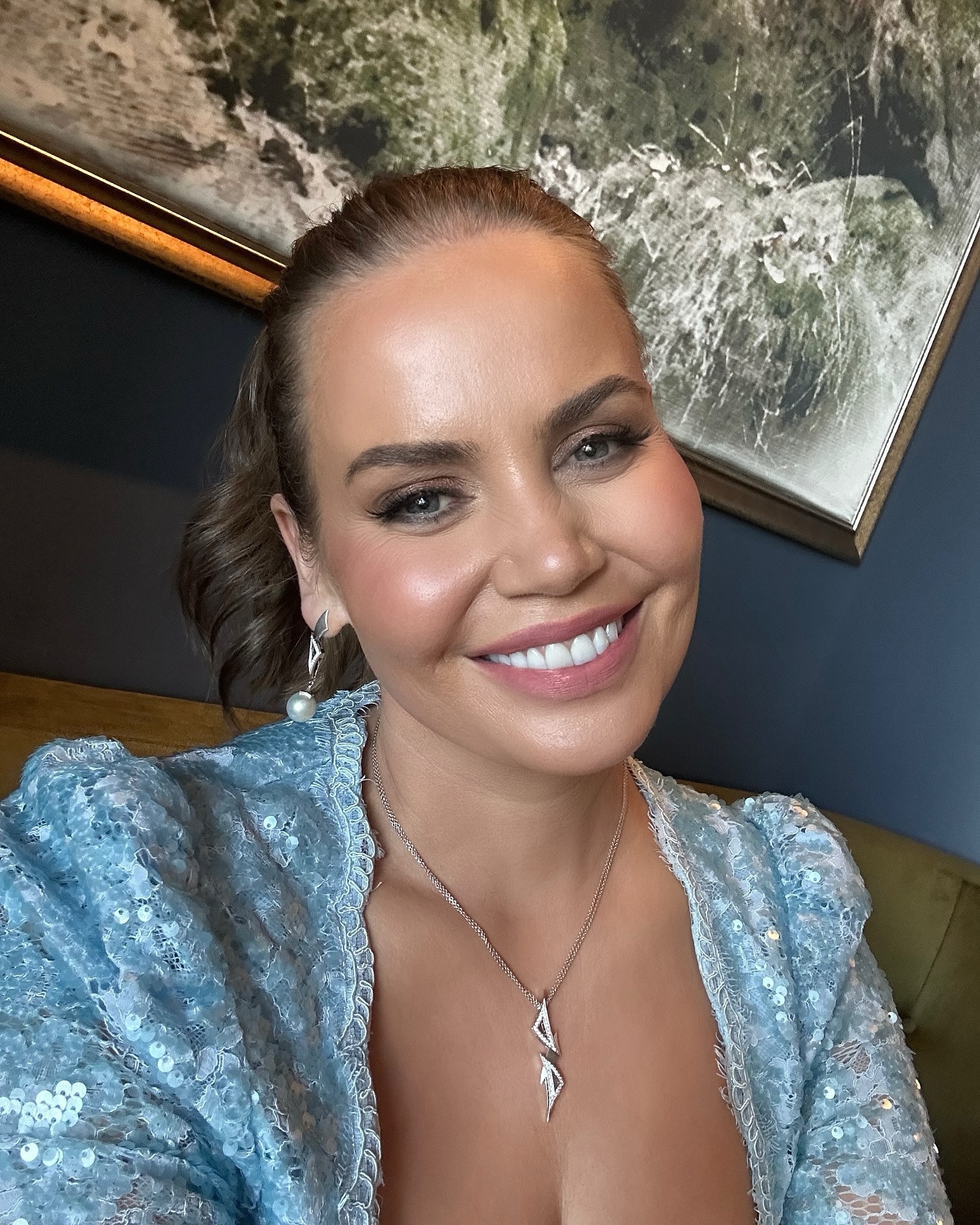 Jelena Dokic smiles at the camera in a sweet selfie.