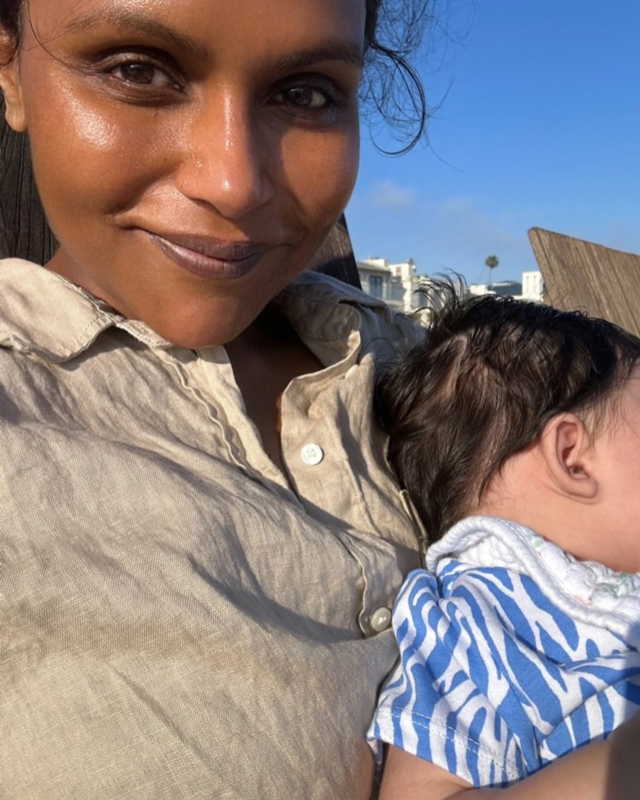Mindy Kaling with new baby Anne