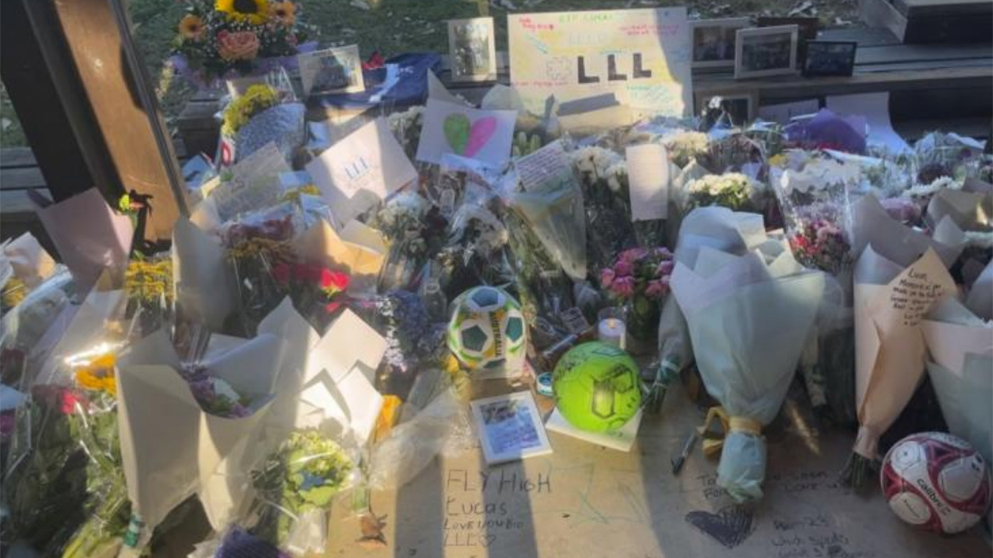 Memorials left after the stabbing death of a 15-year-old at Rouse Hill.