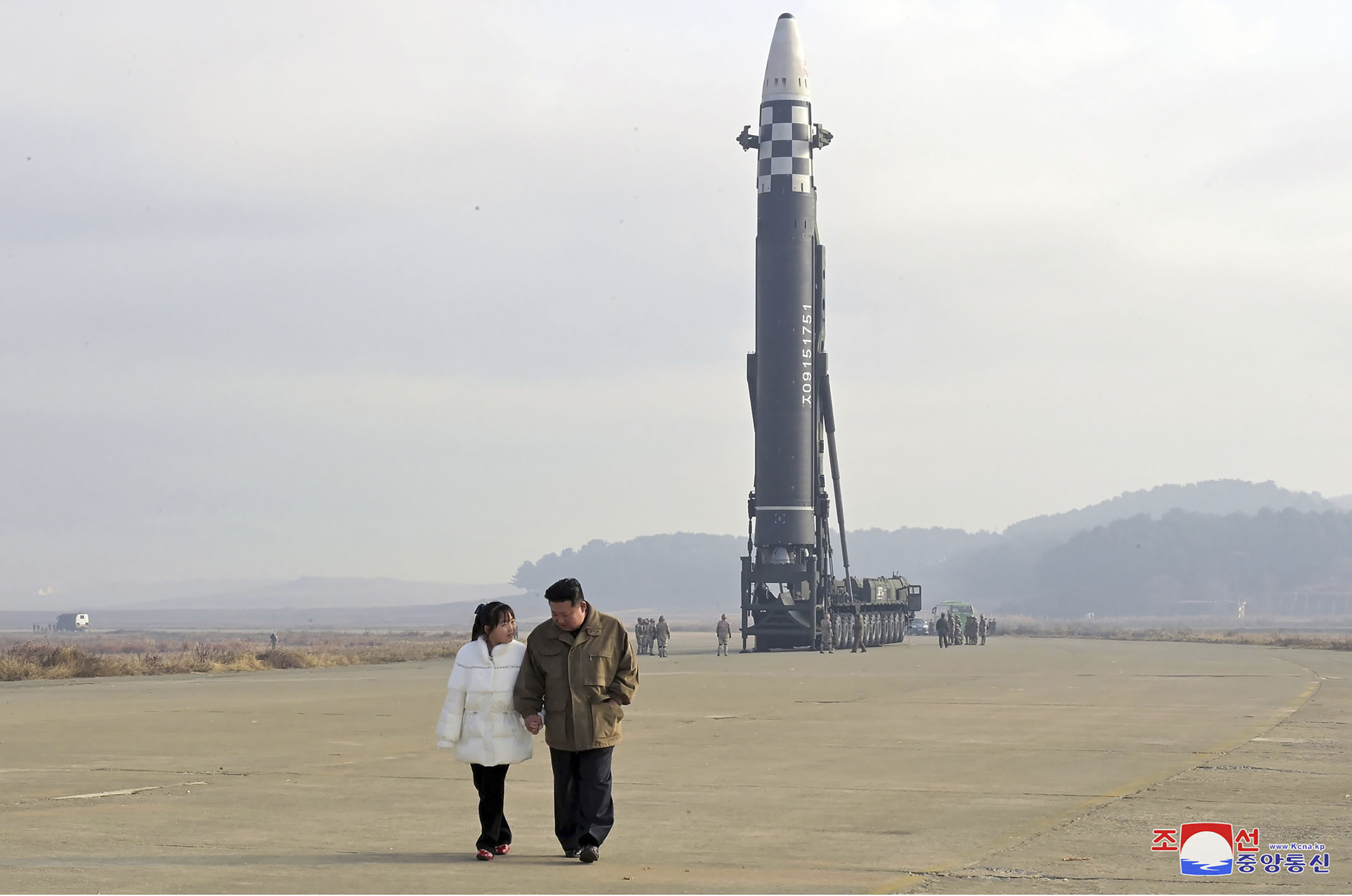 North Korea has unveiled the little-known daughter of its leader Kim Jong Un at a missile launch site.