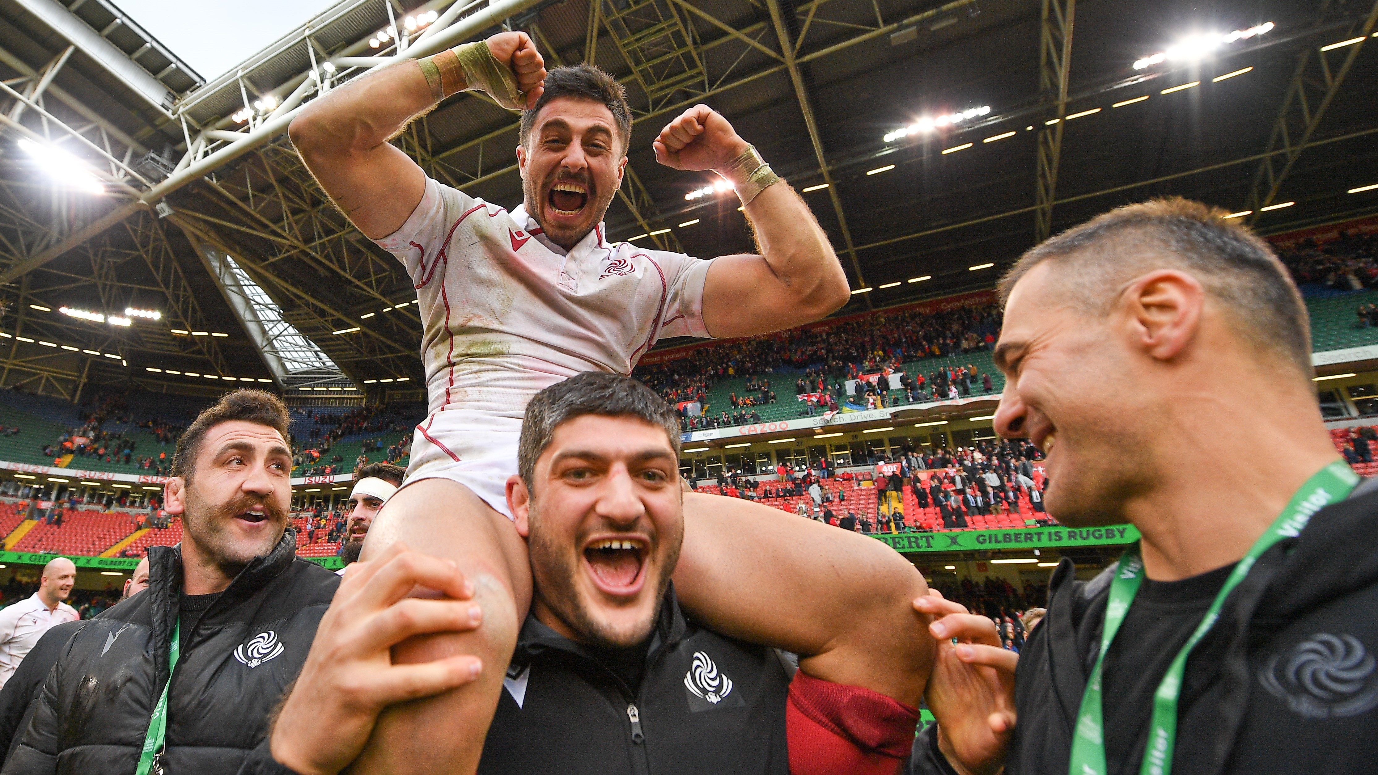 Tedo Abzhandadze of Georgia raises his fists after an upset win over Wales in Cardiff.
