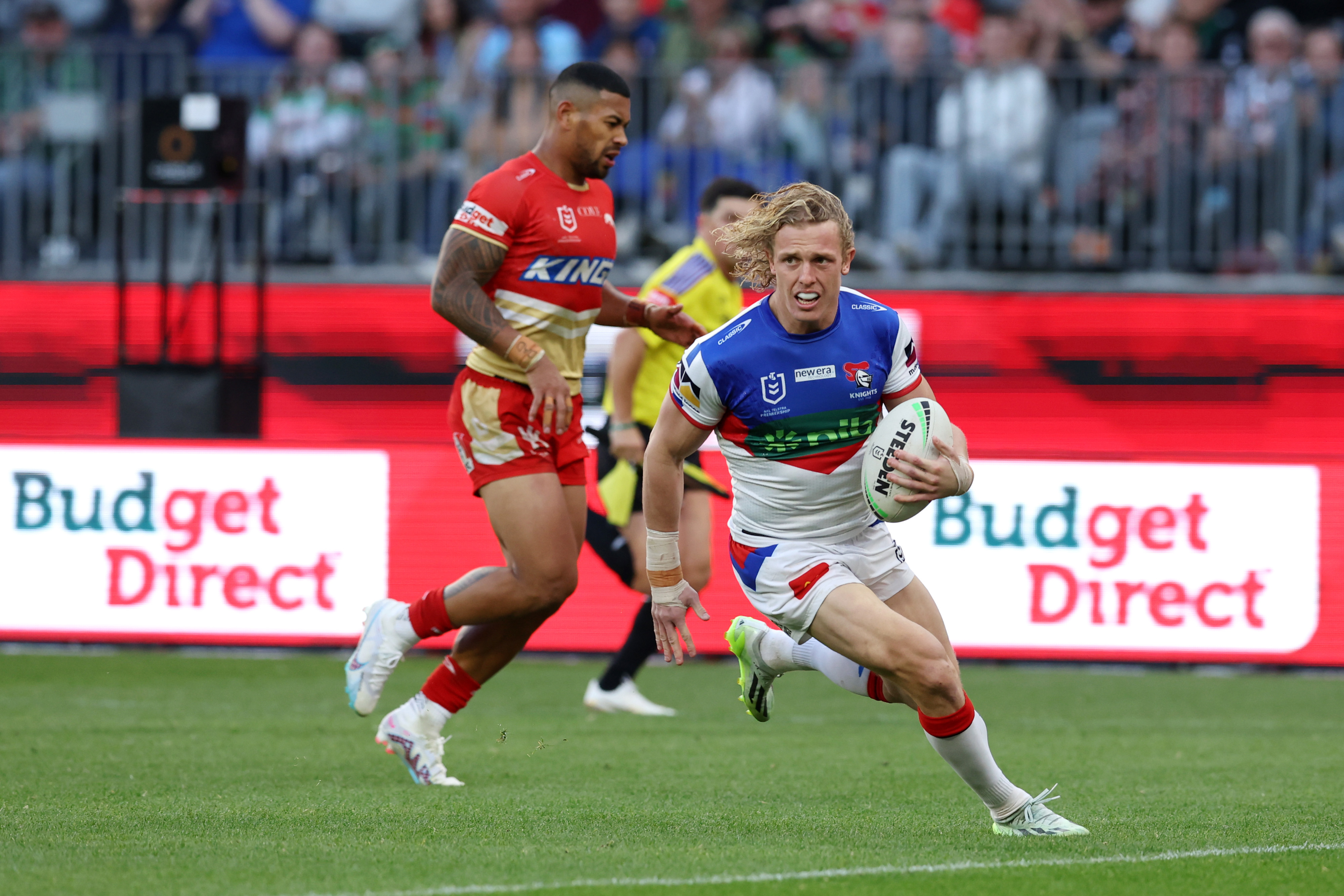 Phoenix Crossland of the Knights scores a try during the round 23 NRL match between Dolphins and Newcastle Knights at Optus Stadium on August 05, 2023 in Perth, Australia. (Photo by Will Russell/Getty Images)