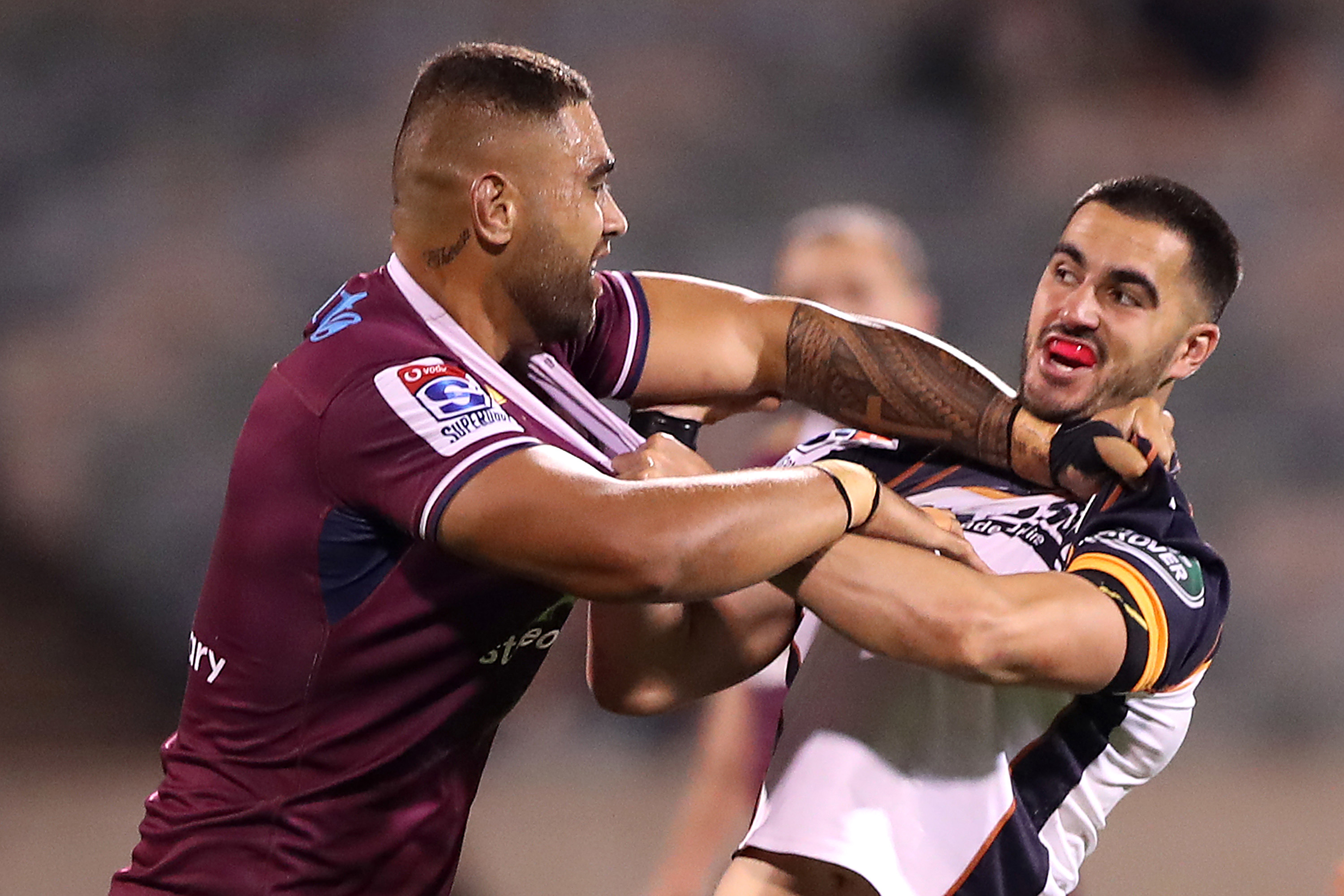 Lukhan Salakaia-Loto of the Reds and Tom Wright of the Brumbies scuffle.