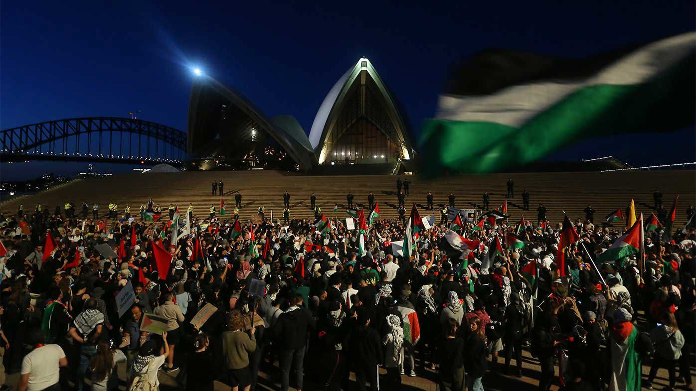 Palestine supporters rally outside the Sydney Opera House.