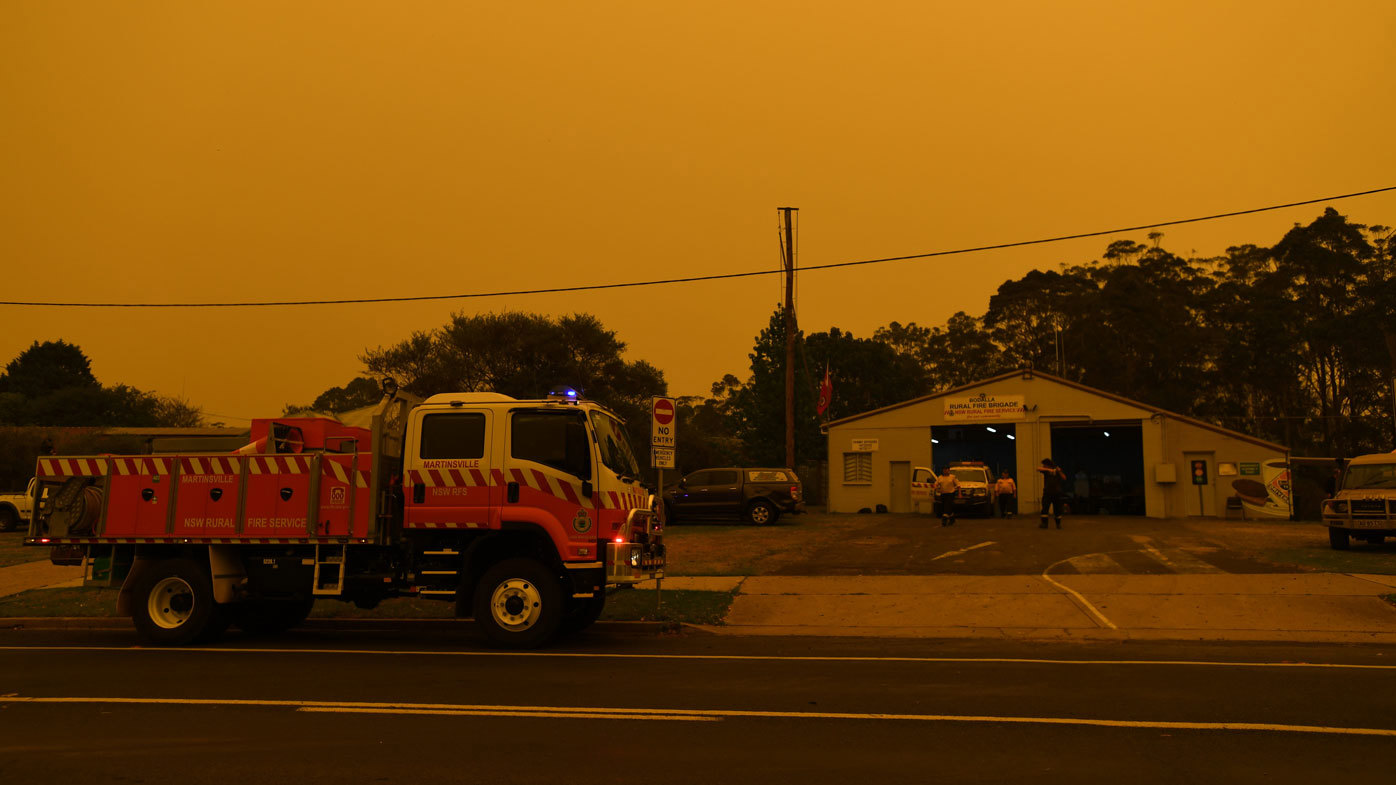 The small village of Bodalla descends into almost darkness at 6.30pm south of Batemans Bay, Saturday, January 4, 2020. The South Coast region on Australia's eastern seaboard, south of Sydney, was devastated on New Year's Eve by bushfire and is under threat again with extreme fire danger, temperatures 40's and strong westerly winds.