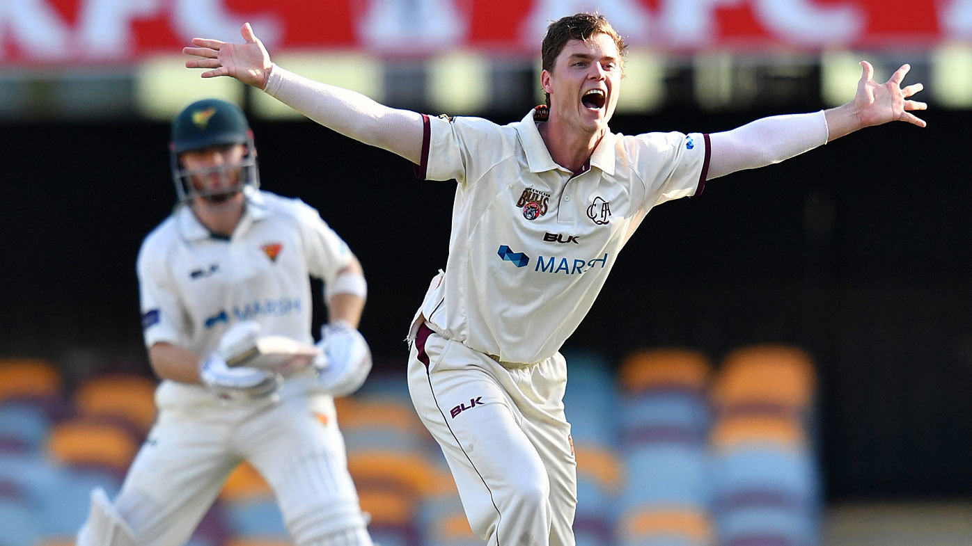 Mitchell Swepson (right) of the Bulls appeals unsuccessfully for the wicket of Charlie Wakim (left) of the Tigers during the Marsh Sheffield Shield match 