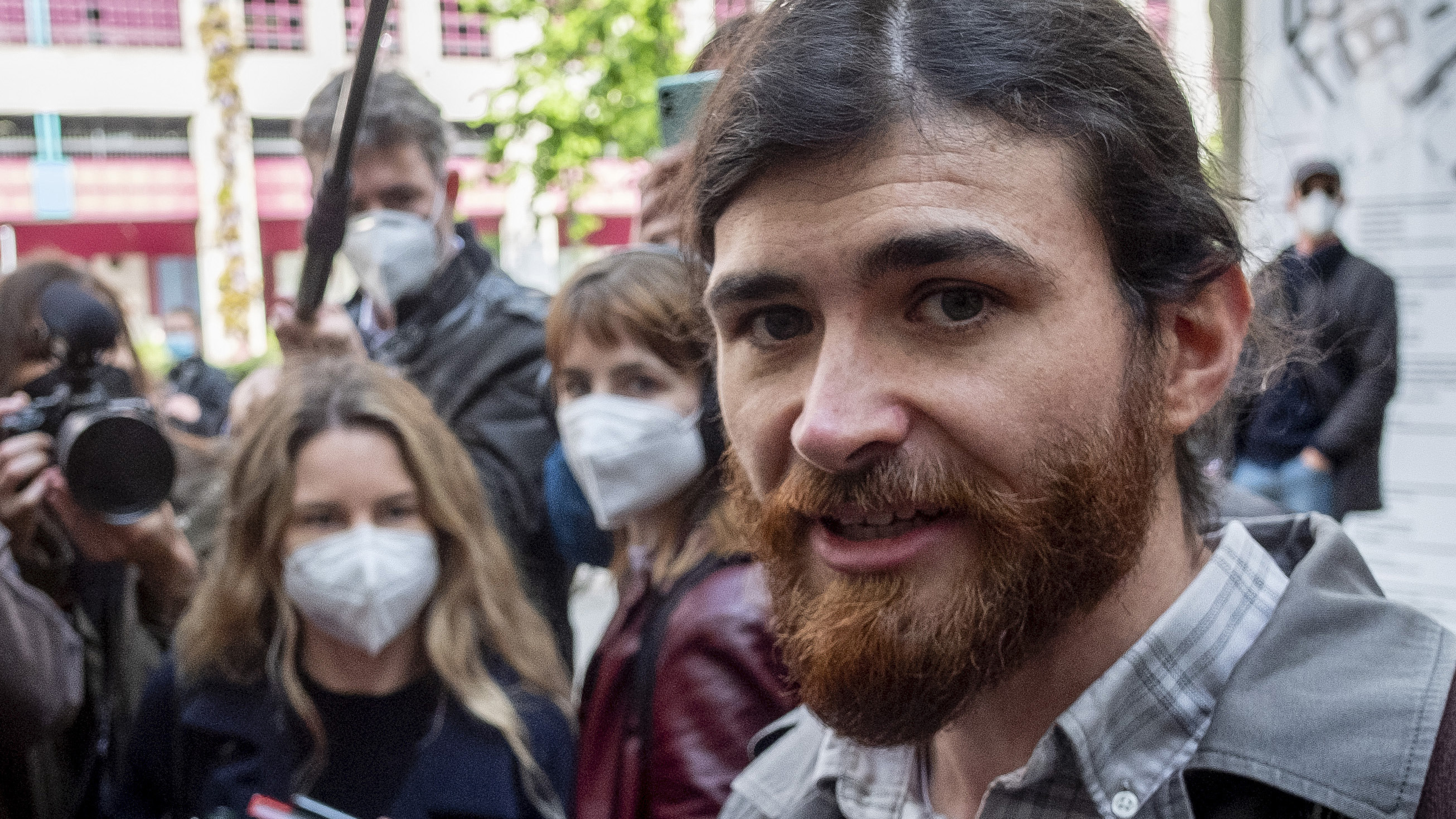 The defendant identified only as 1st Lt. Franco A. due to German privacy rules, walks to a court for the start of a trial on charges of preparing a serious act of violence endangering the state in Frankfurt, Germany.