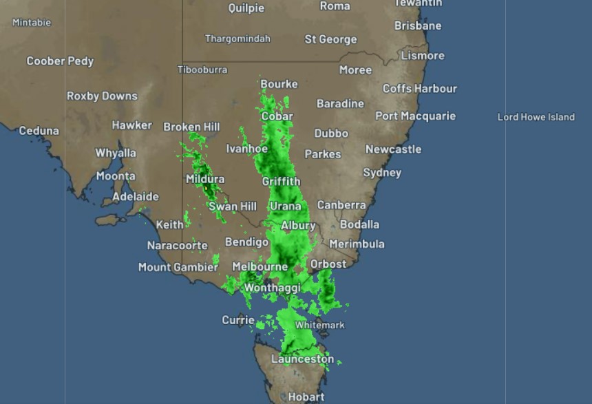 A huge rainband has delivered heavy rain to inland areas across Victoria, NSW, and northern Tasmania. 