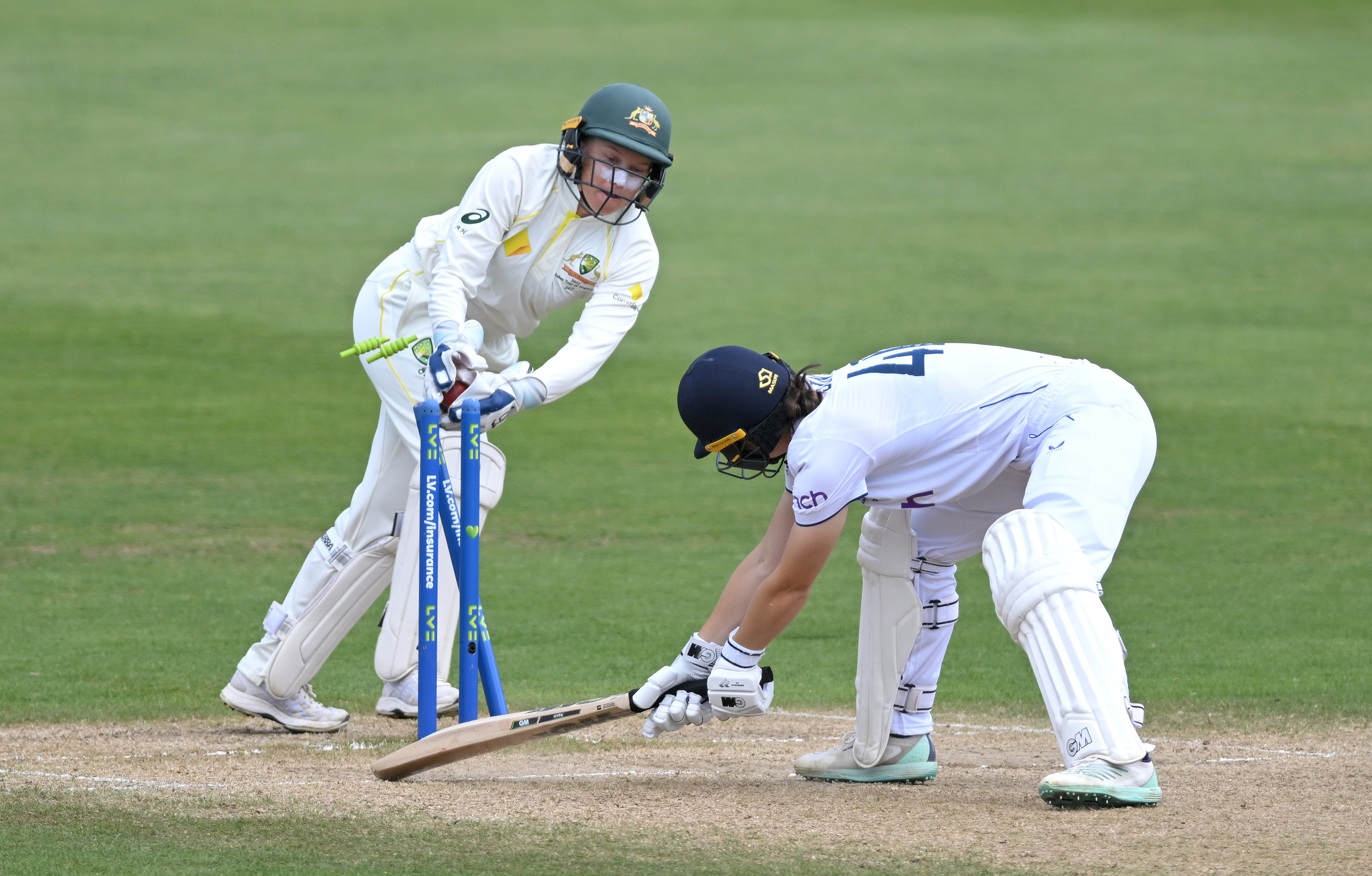 Alyssa Healy battled two broken fingers to help Australia behind the stumps.