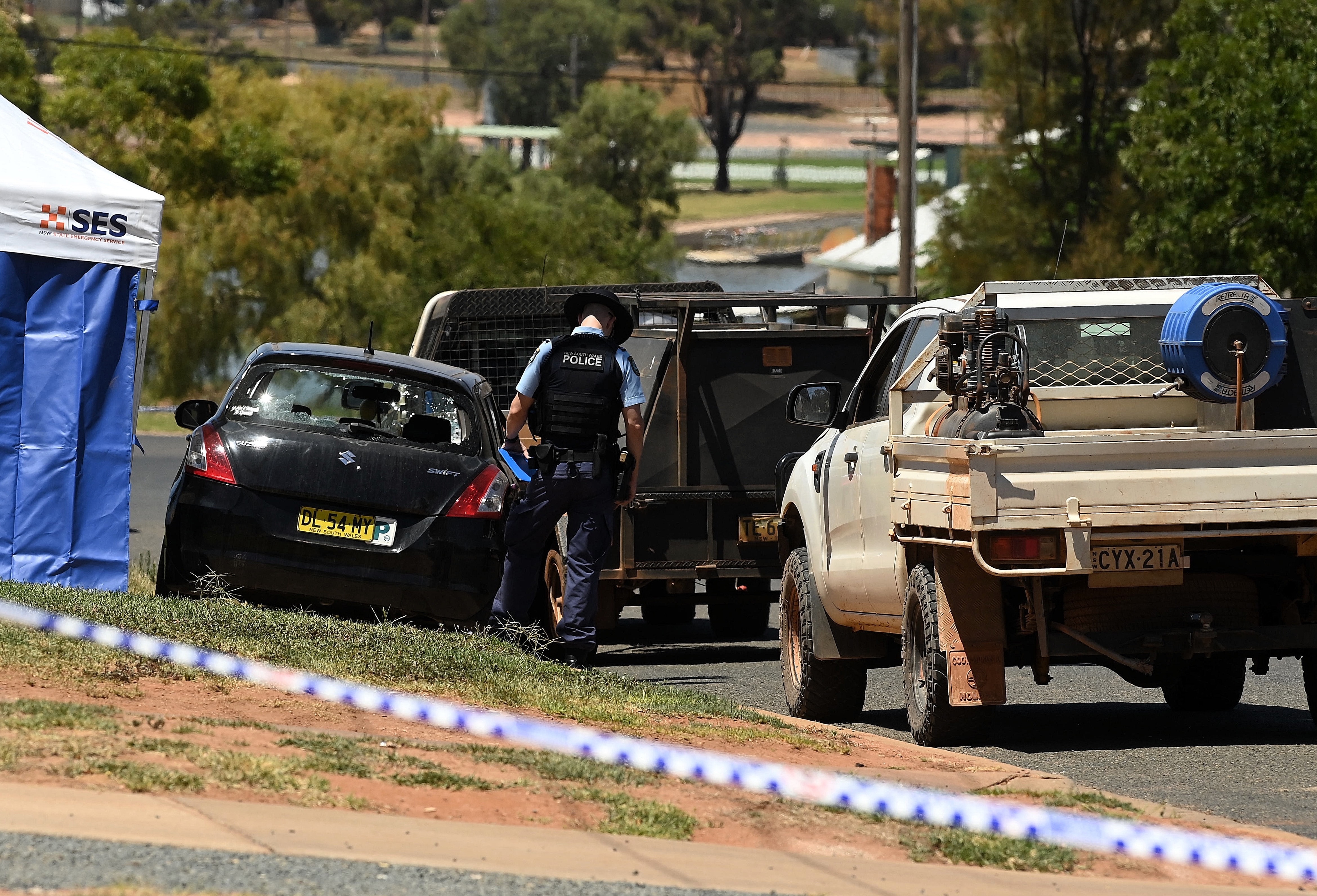 The black suzuki swift car with blown out rear window where a woman and a man were shot on Bokhara Street in Lake Cargelligo.
