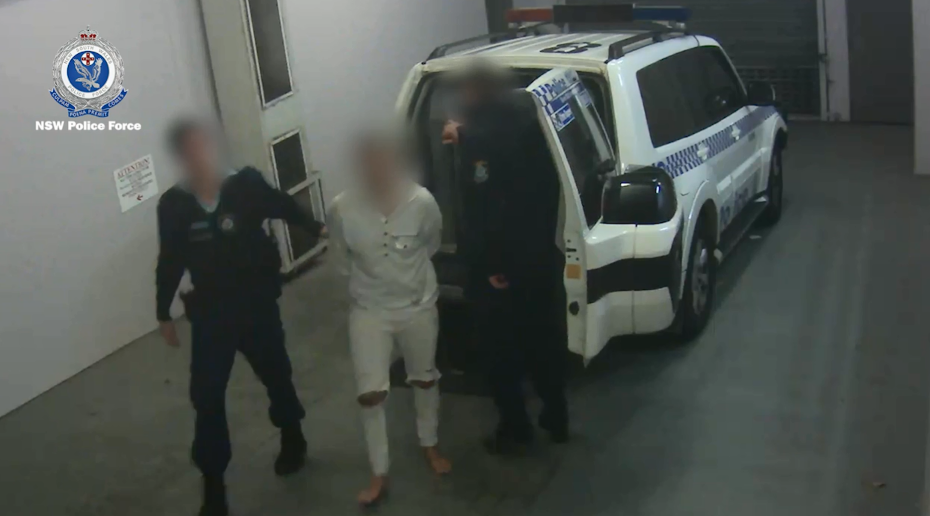 A Brisbane man is taken into custody in Sydney over the alleged murder of his parents at their home in Joyner.