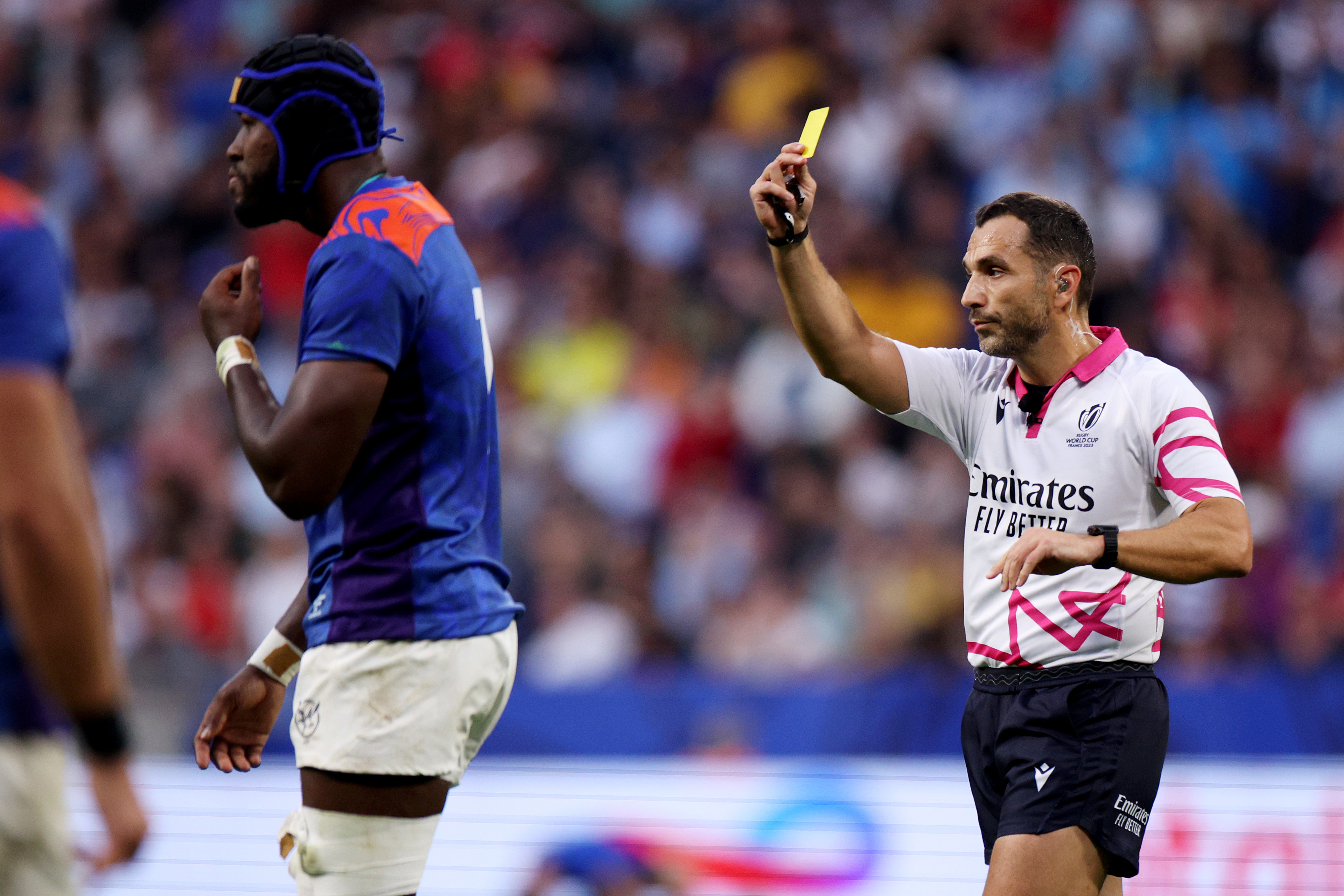 Tjiuee Uanivi of Namibia leaves the field after receiving a yellow card from Referee Mathieu Raynal, as a 8-Minute window for a TMO Bunker Review begins during the Rugby World Cup France 2023 match between Uruguay and Namibia at Parc Olympique on September 27, 2023 in Lyon, France. (Photo by Adam Pretty - World Rugby/World Rugby via Getty Images)
